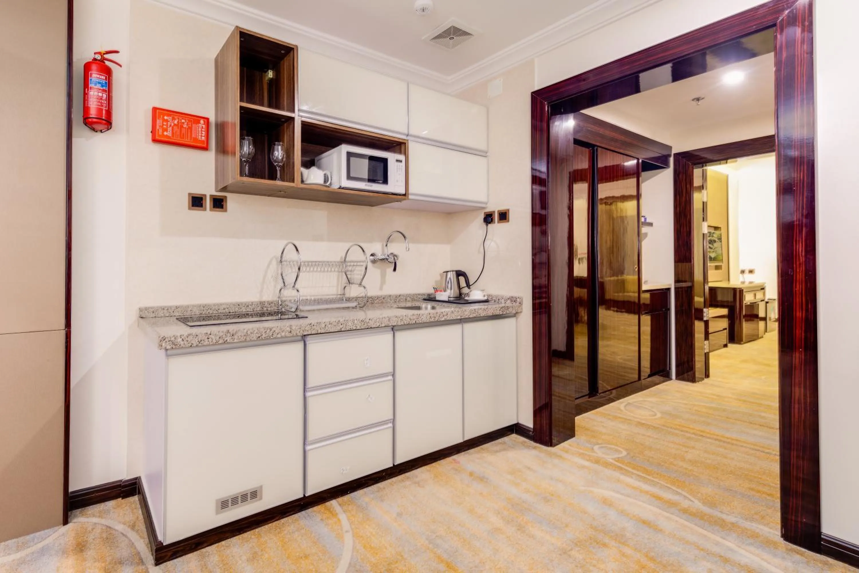 Kitchen or kitchenette in Al Ertiqaa Hotel
