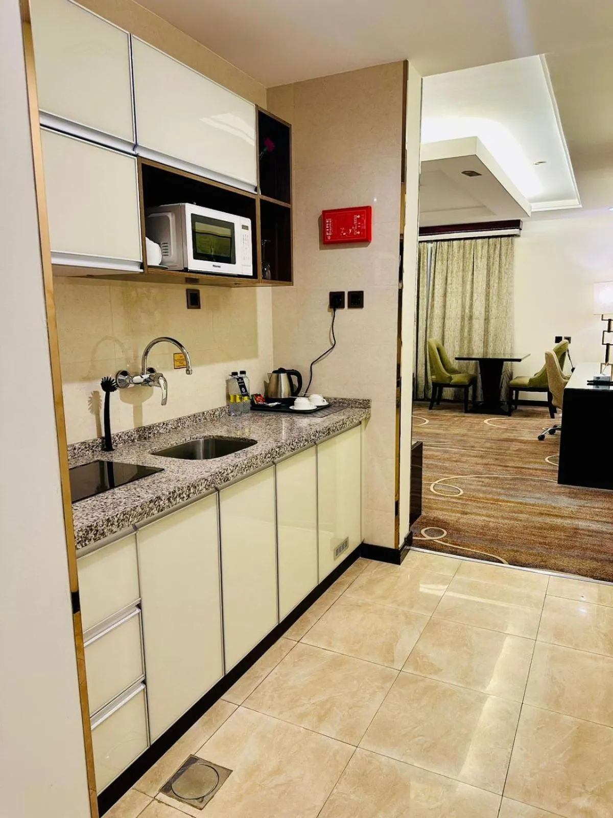 Kitchen or kitchenette in Al Ertiqaa Hotel