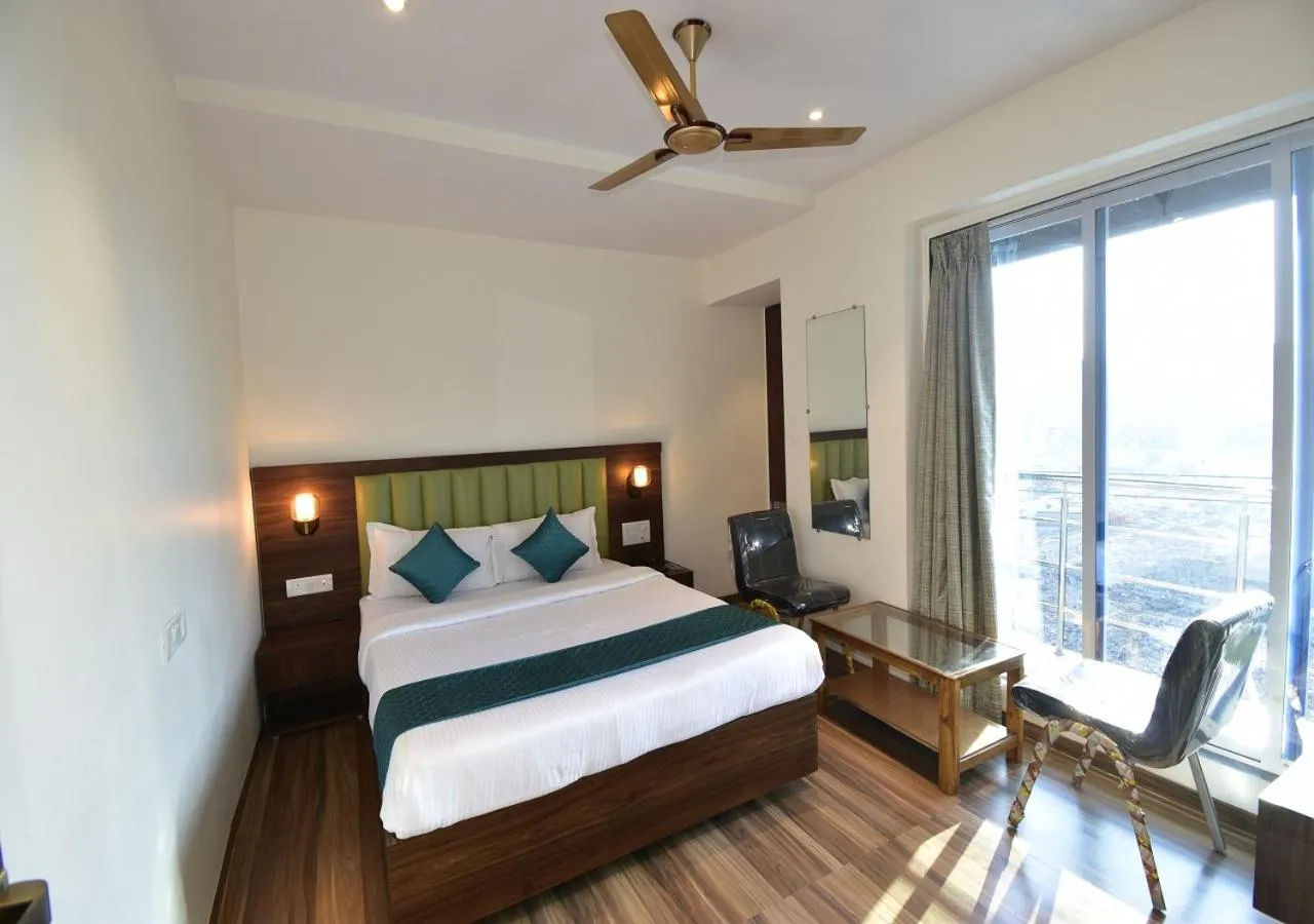 Bed in Hotel Candor Amigo Airoli Mind Space