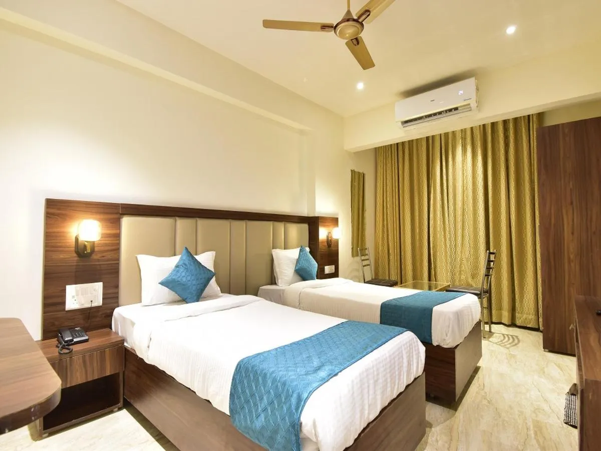 Bed in Hotel Candor Amigo Airoli Mind Space