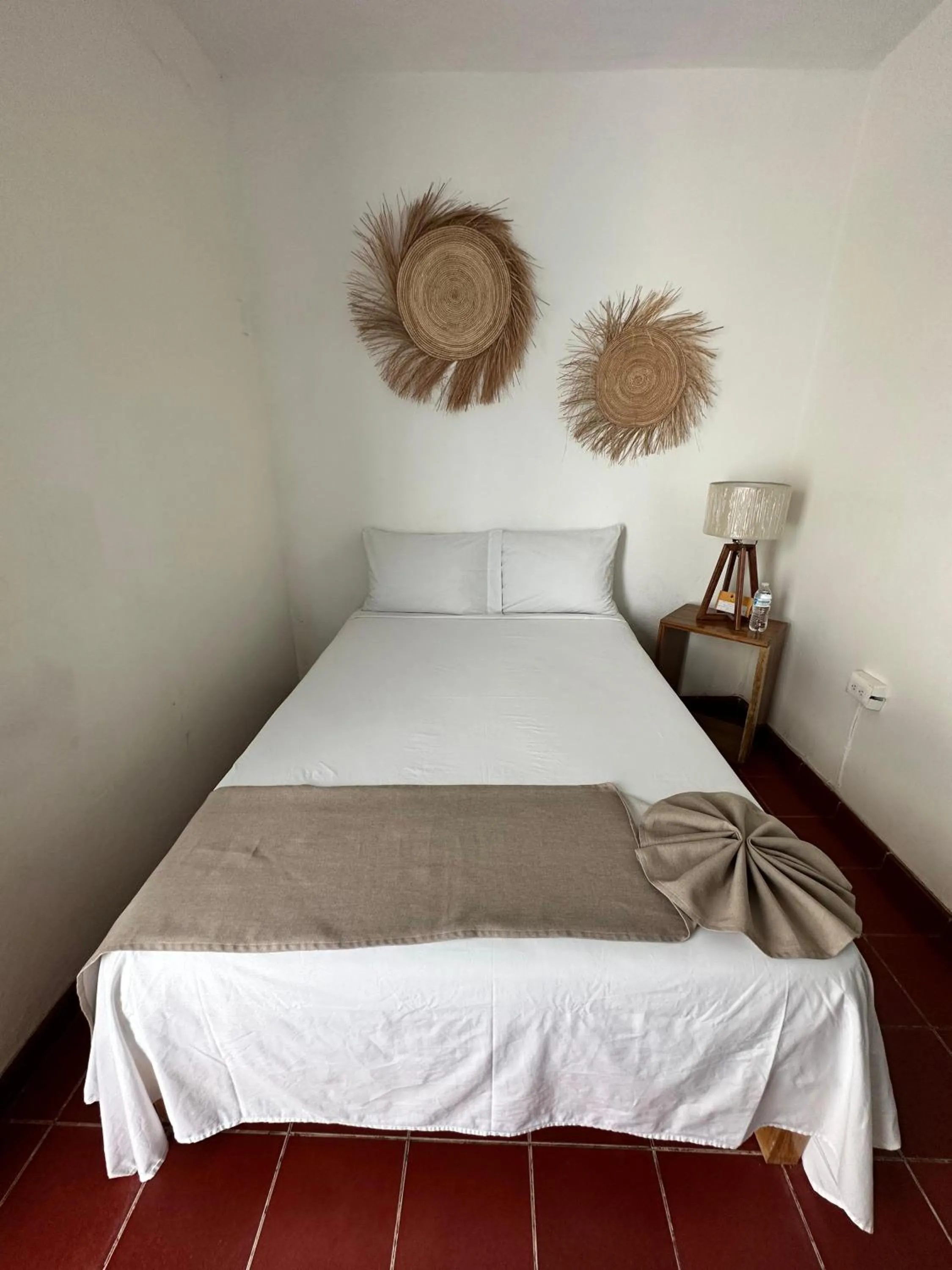 Bed in Creta Hotel & Suites