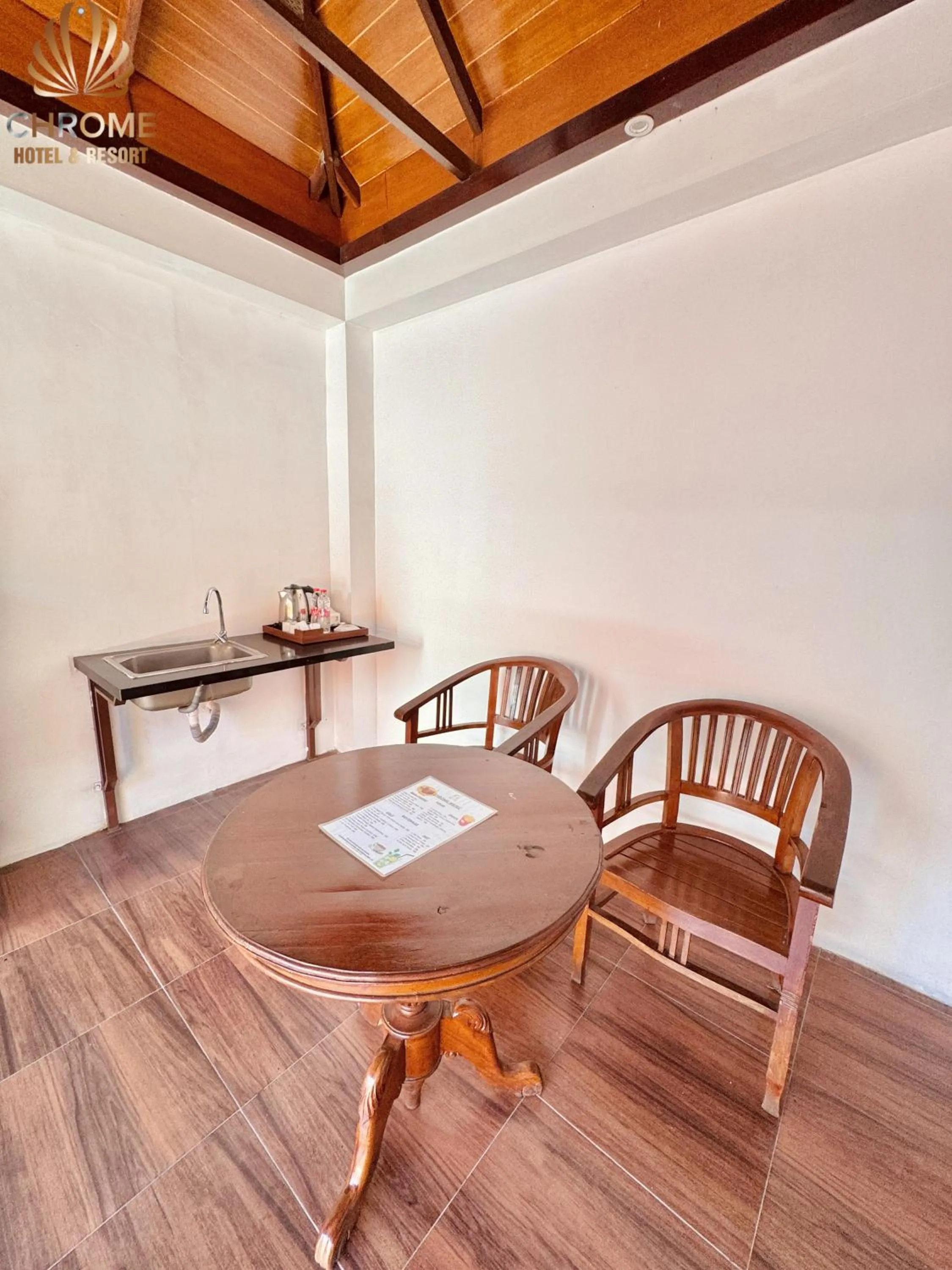 Seating area in chrome hotel & resort solo