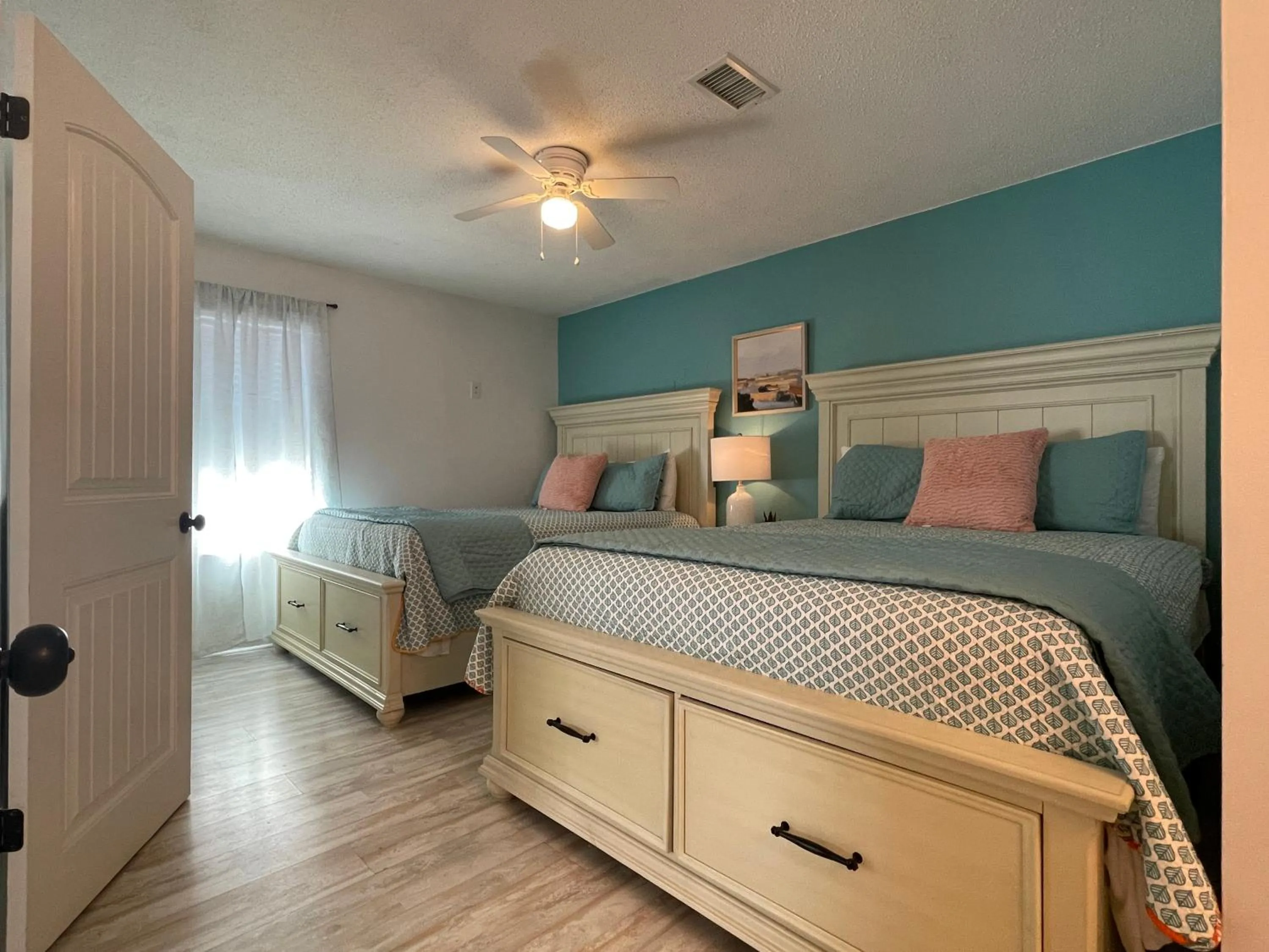 Bed in Ocean Breeze - Beautiful Condo & Pet Friendly