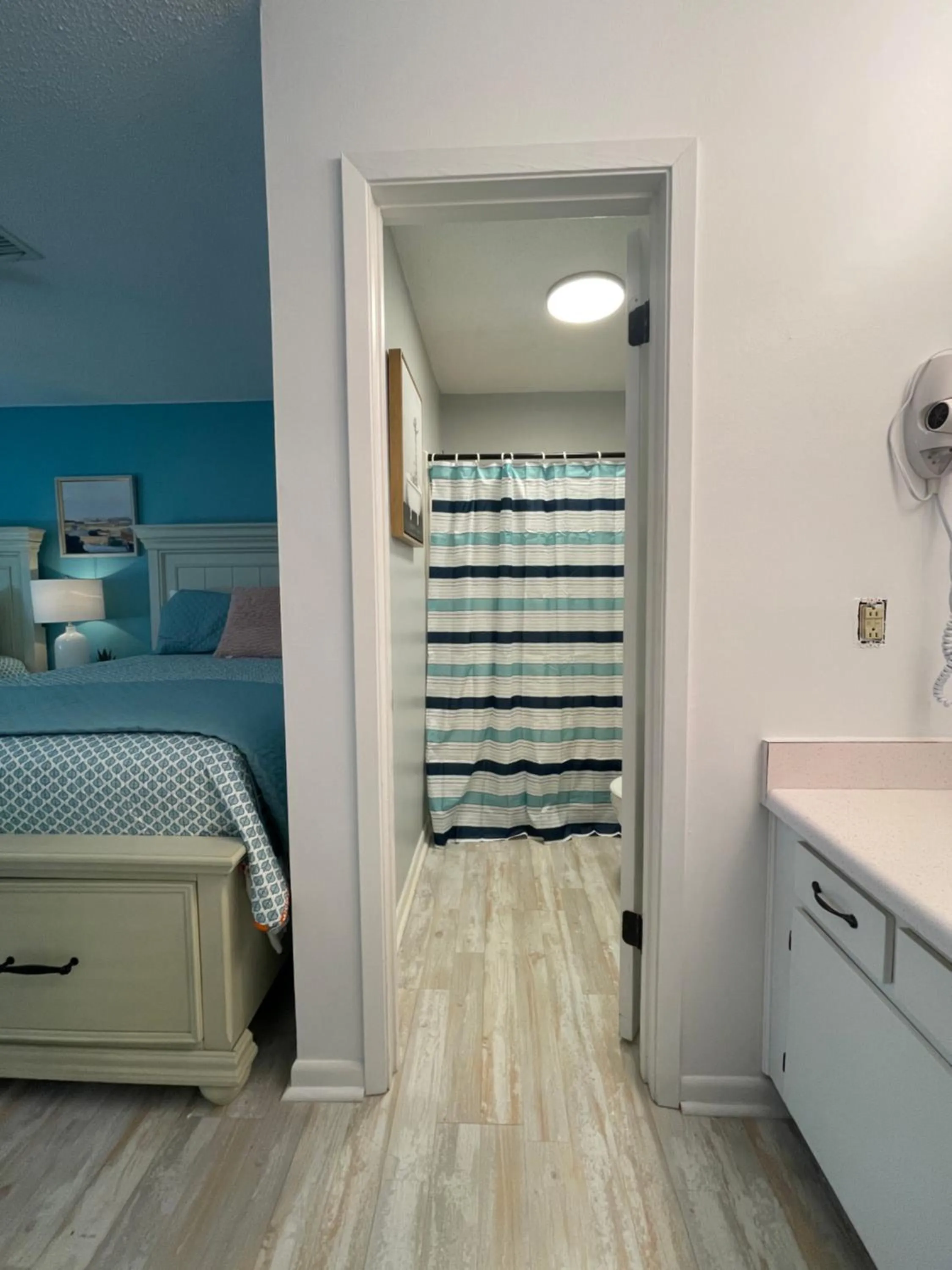 Bed in Ocean Breeze - Beautiful Condo & Pet Friendly