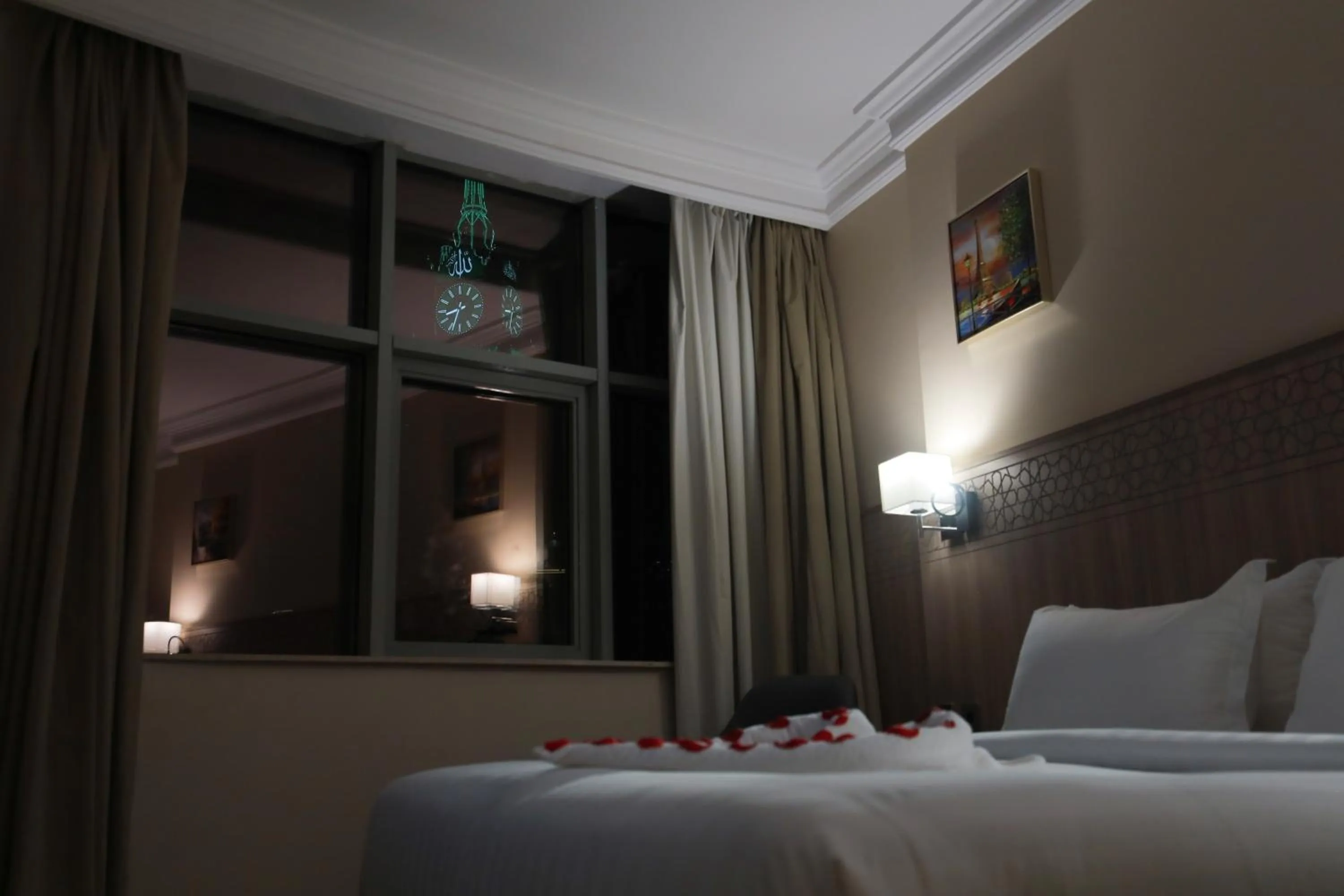 Bed in Nawazi Towers Hotel