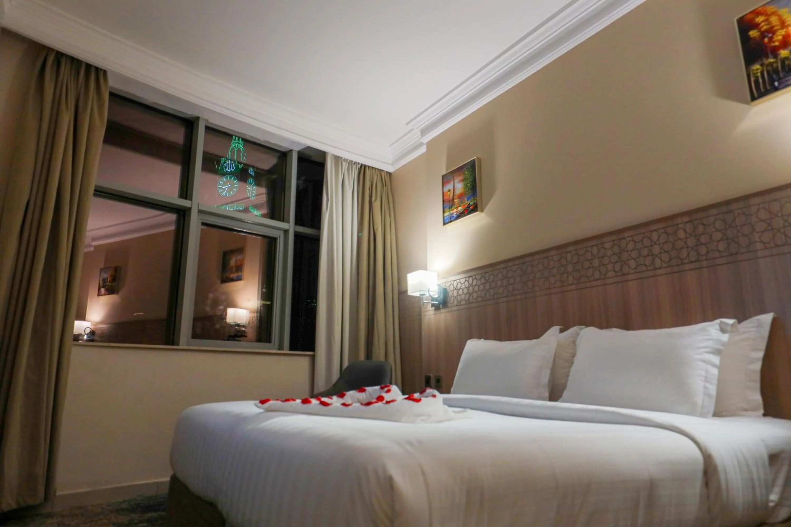 Bed in Nawazi Towers Hotel