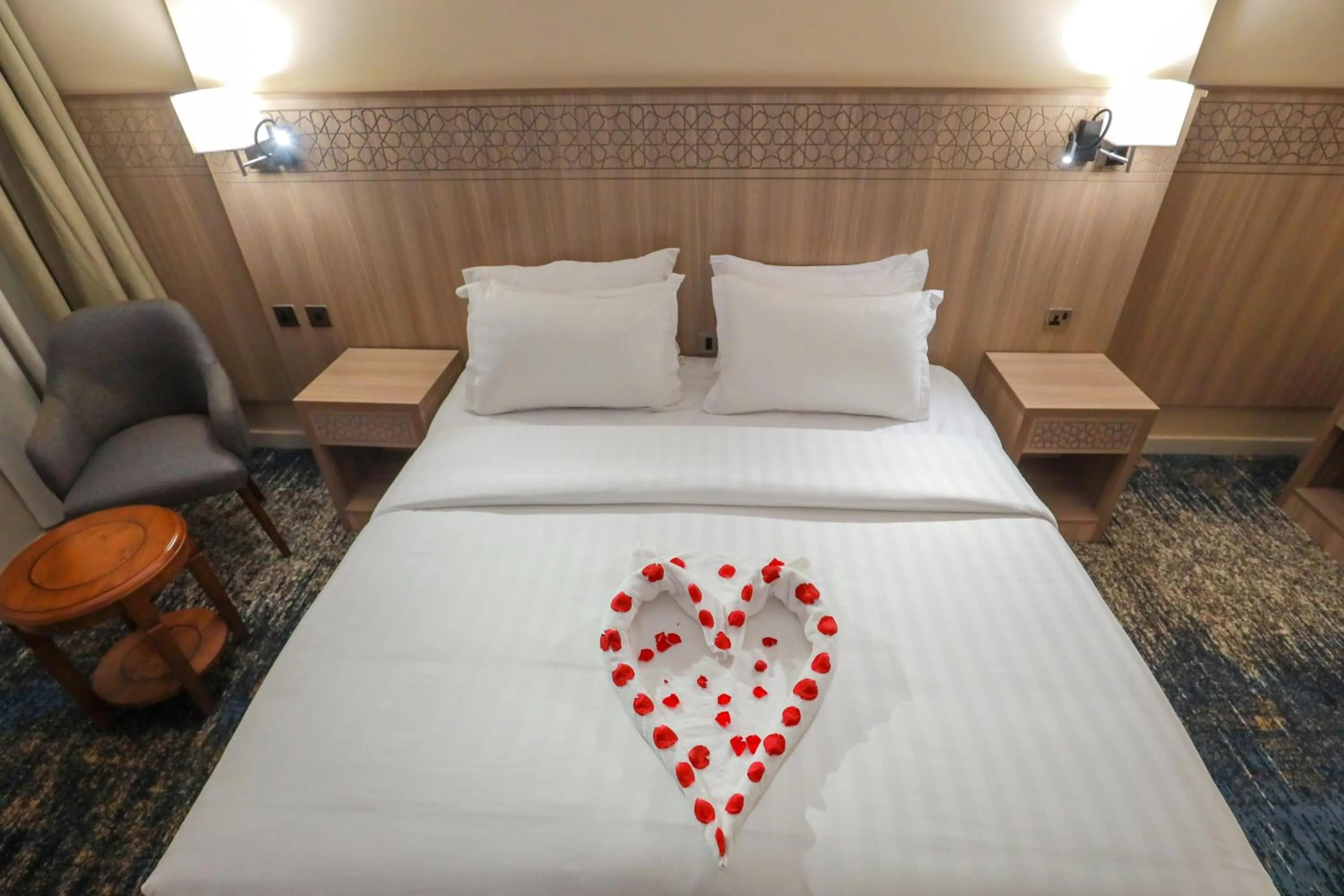 Bed in Nawazi Towers Hotel