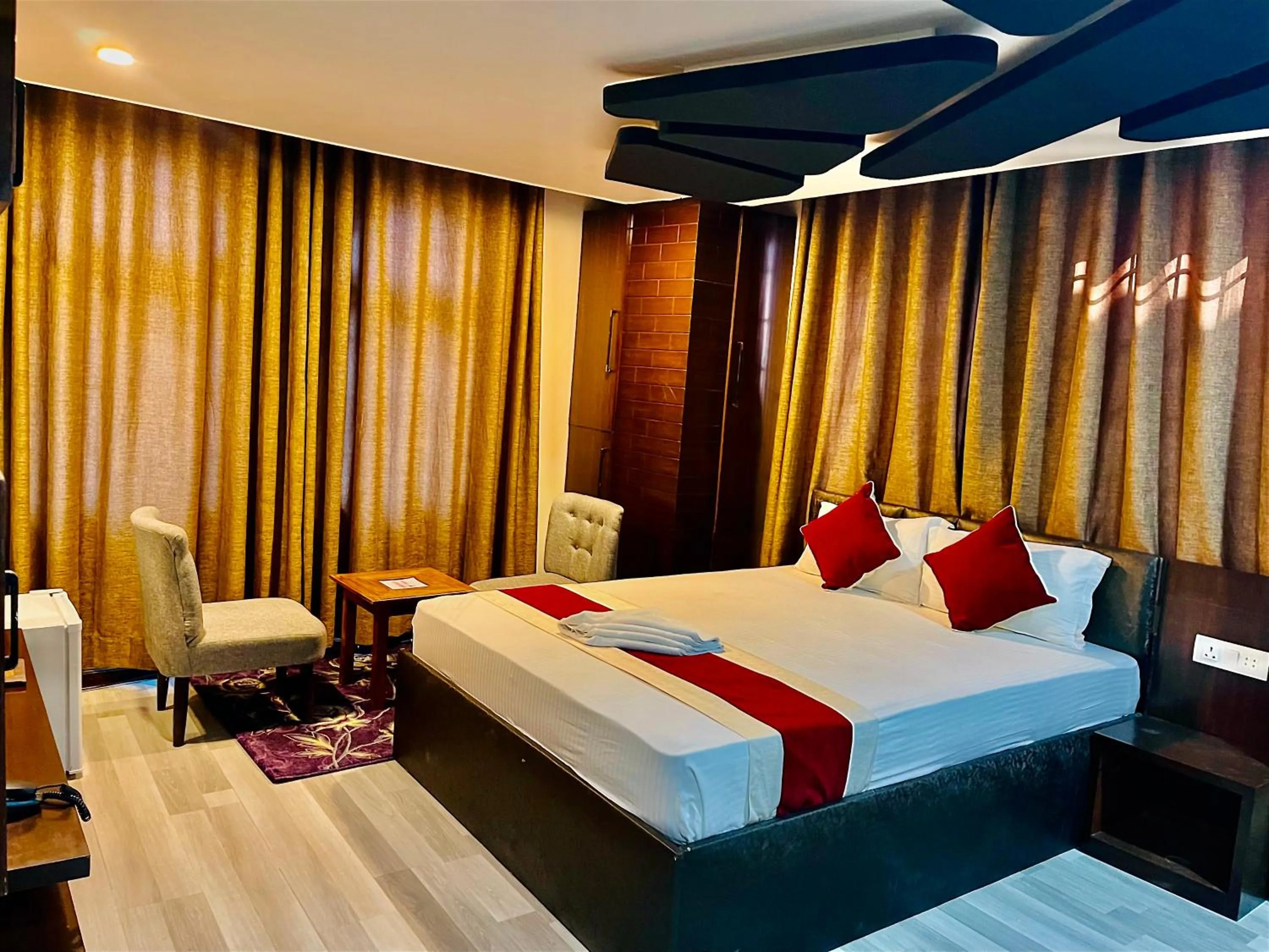 Photo of the whole room, Bed in Hotel Lotus Grand Pvt Ltd