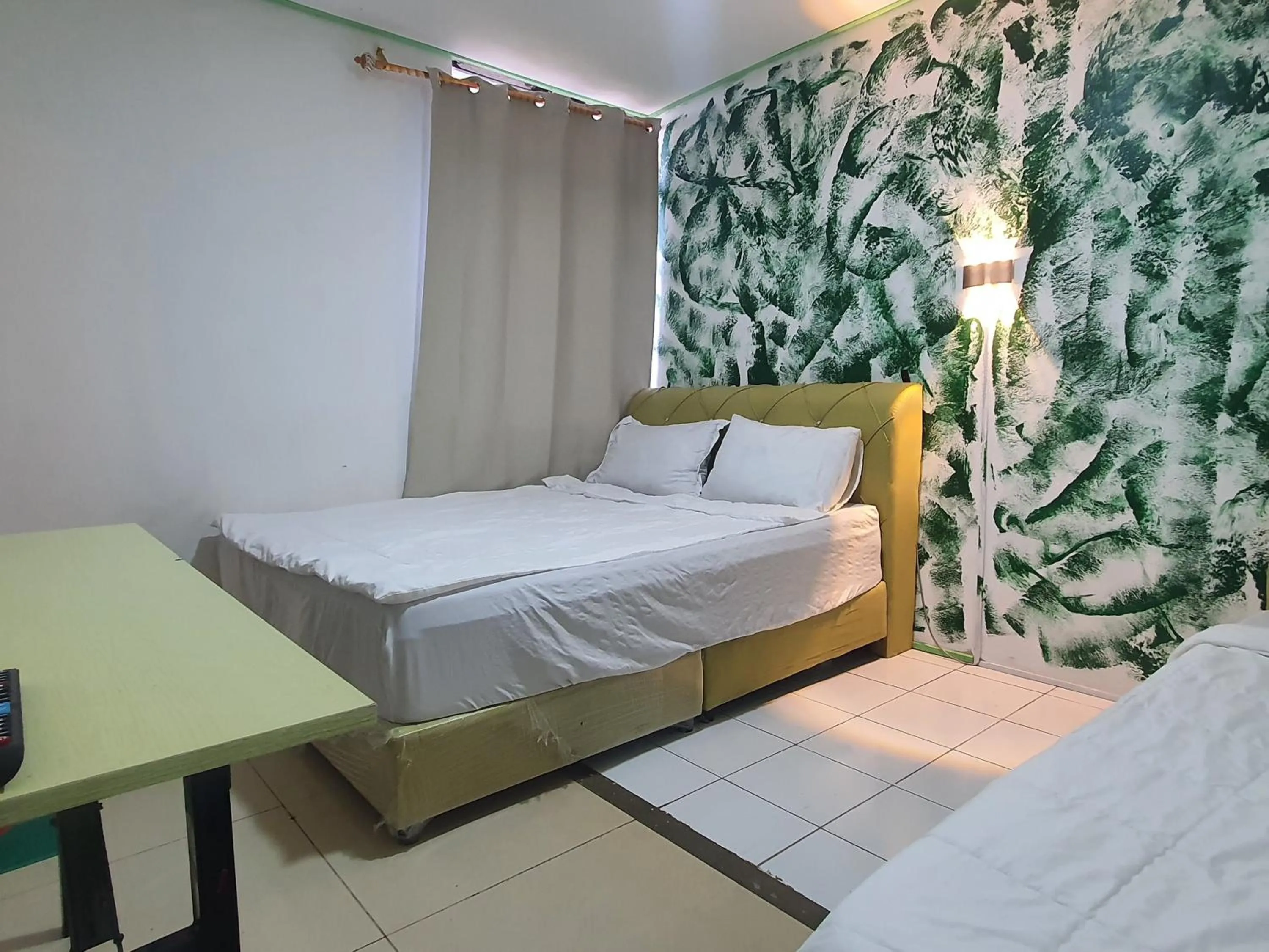 Bedroom, Bed in Hotel O Green Leaf Guest Lodge Kk