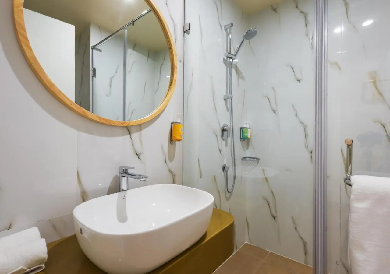 Bathroom in Bloom Hotel - Golf Course Road, Sector 43