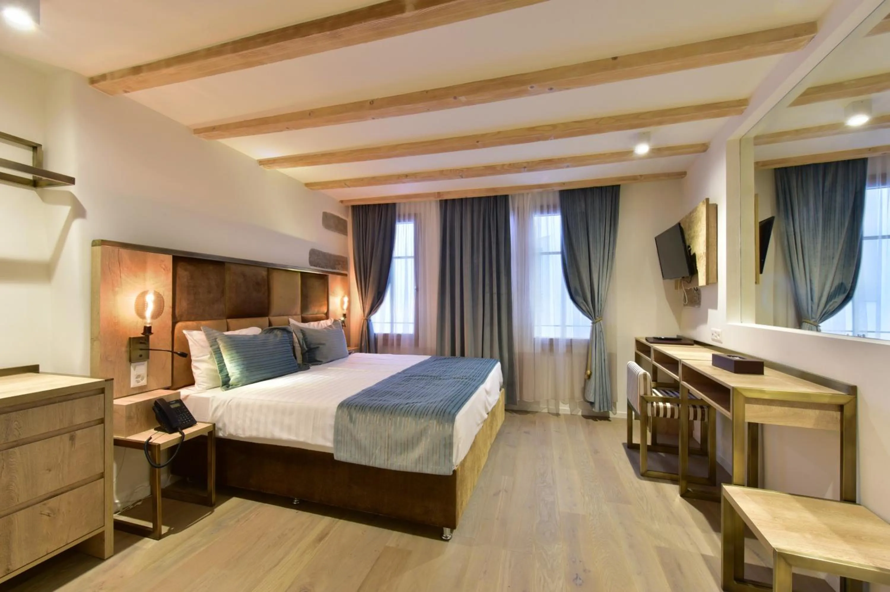 Bed in Hôtel Rousseau Plus