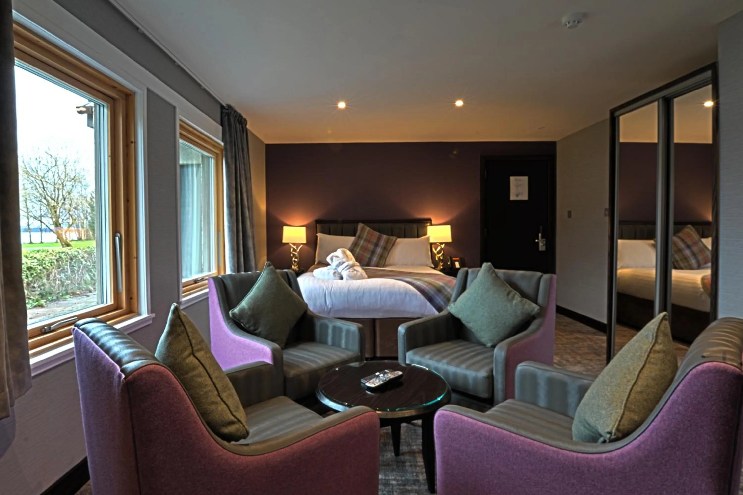 Seating area, Bed in The Beach House Loch Lomond