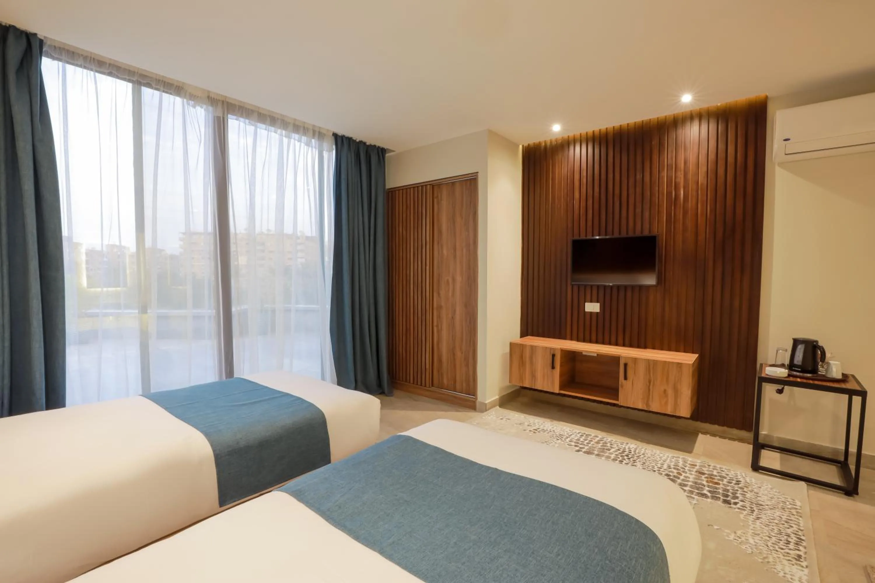 Bed in Pyramid Front Hotel