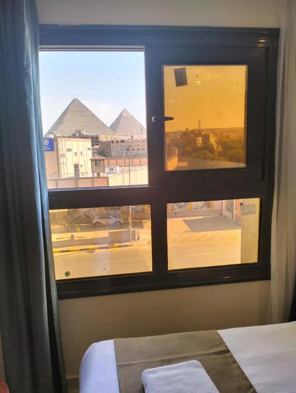 View (from property/room), Bed in Pyramid Front Hotel