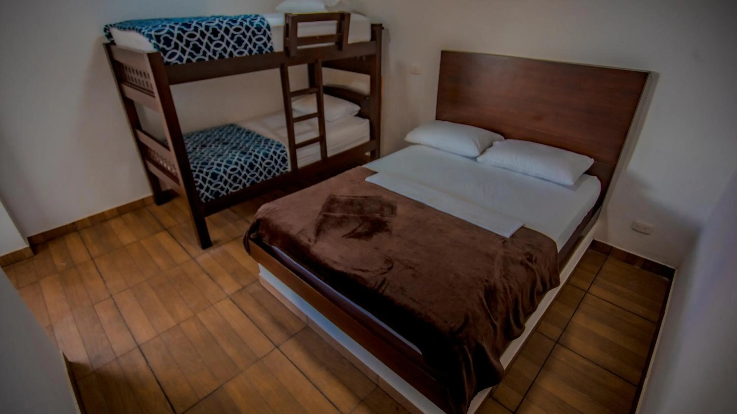 Bed in Hotel Hacienda San Isidro