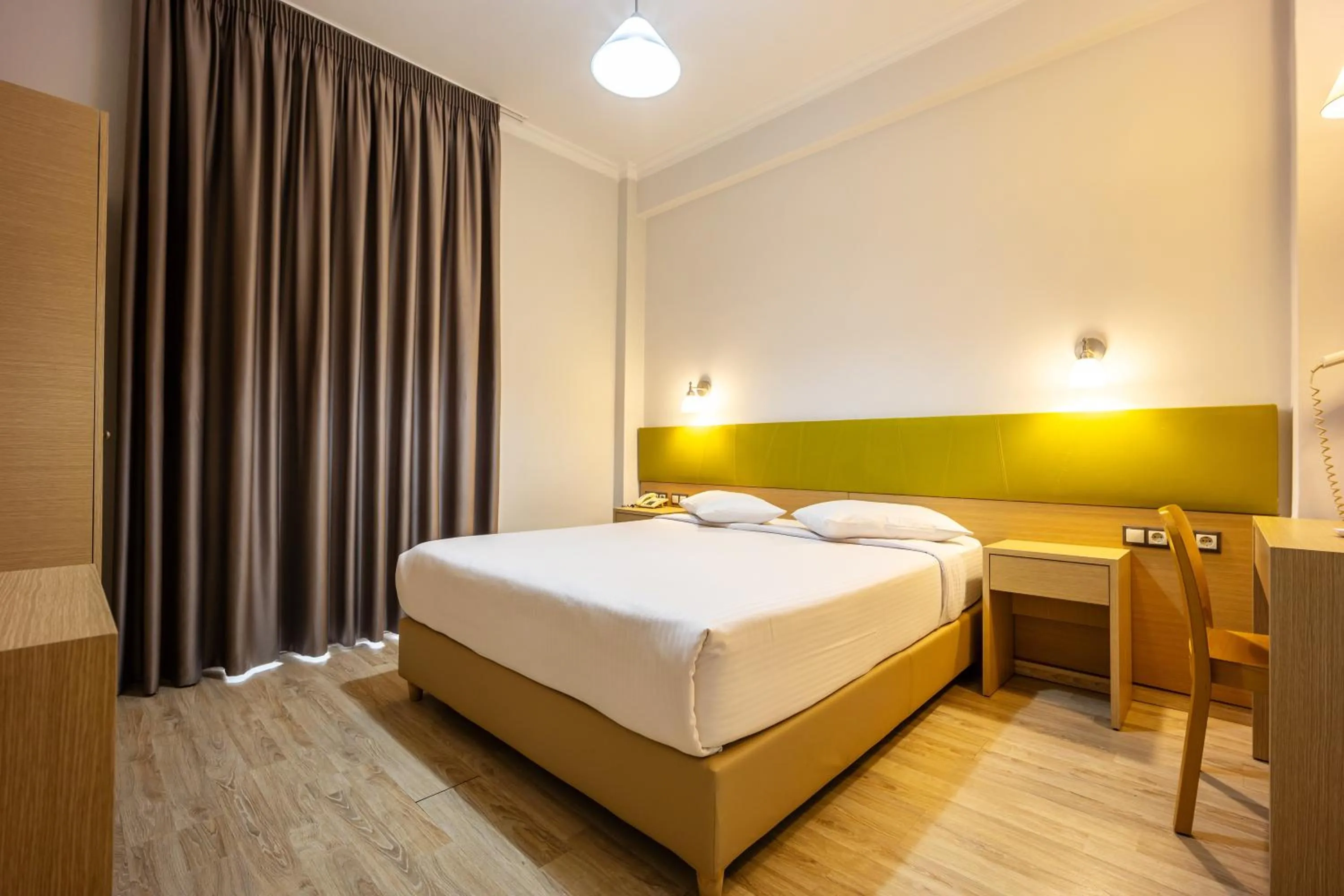 Bed in Athens City Hotel