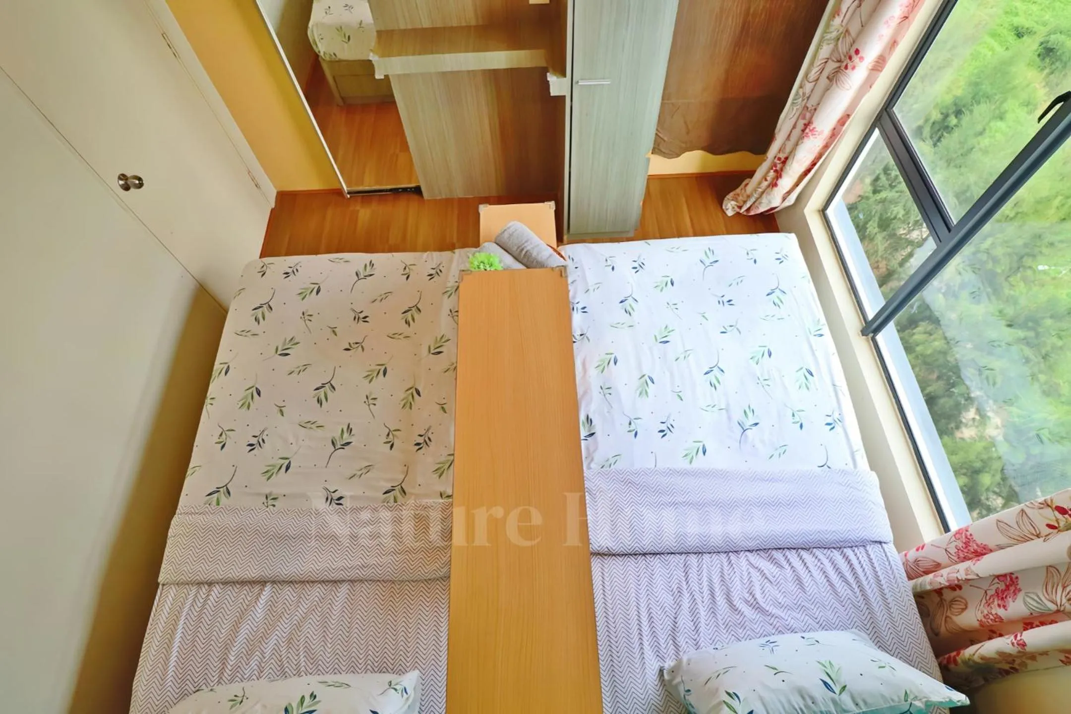 Seating area, Bed in Nature Home - Swiss Garden Resort Residences - Weekend Free Breakfast