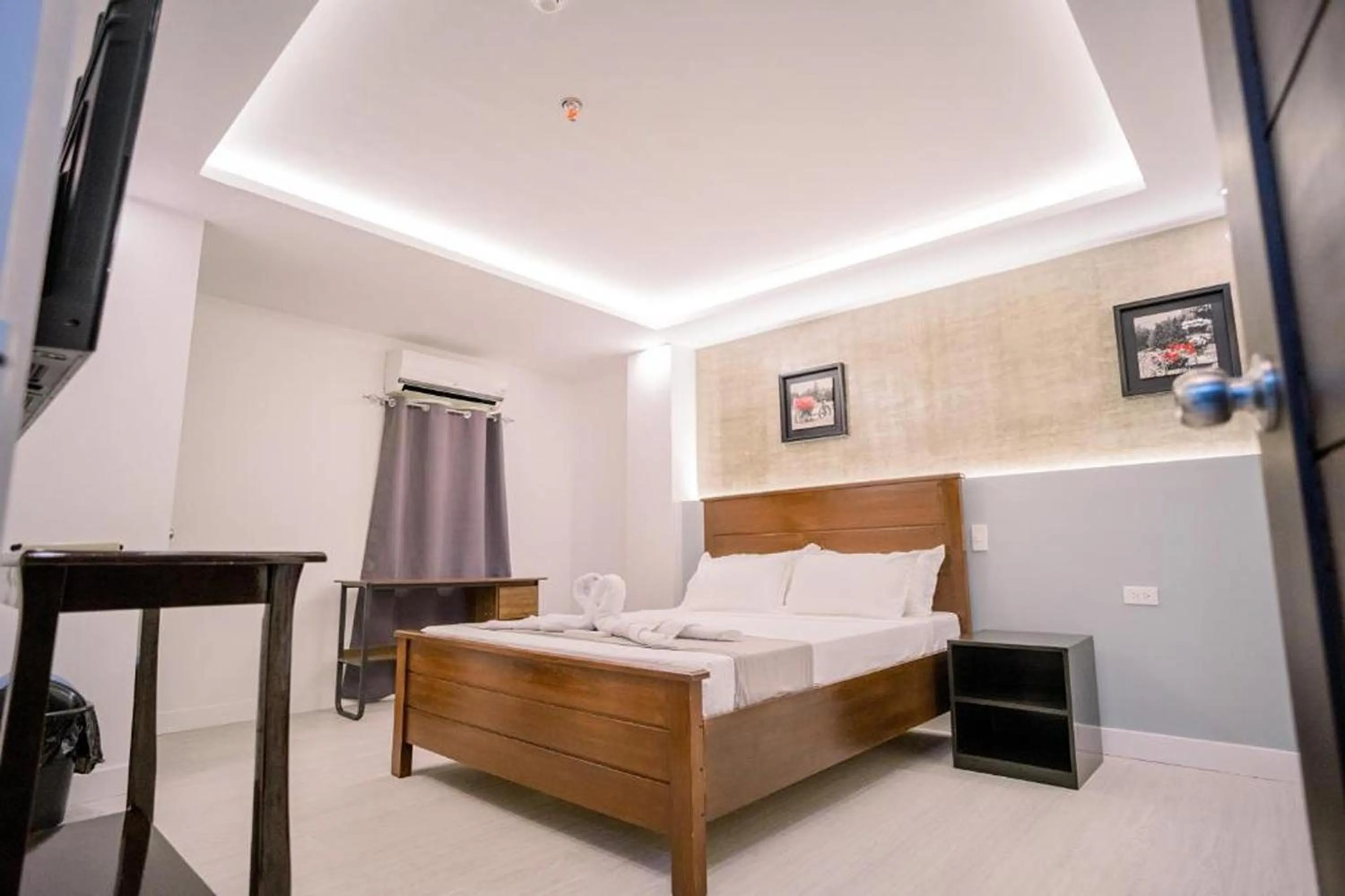 Photo of the whole room, Bed in Spotlight Hotel near Hundred Islands Wharf