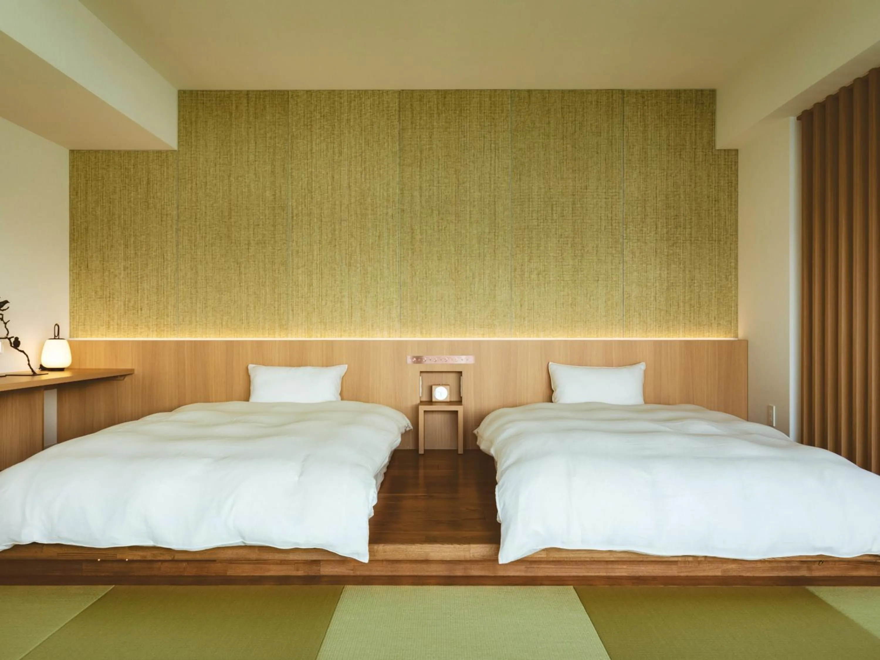 Photo of the whole room, Bed in Etajimasou Hotel & SPA Hiroshima