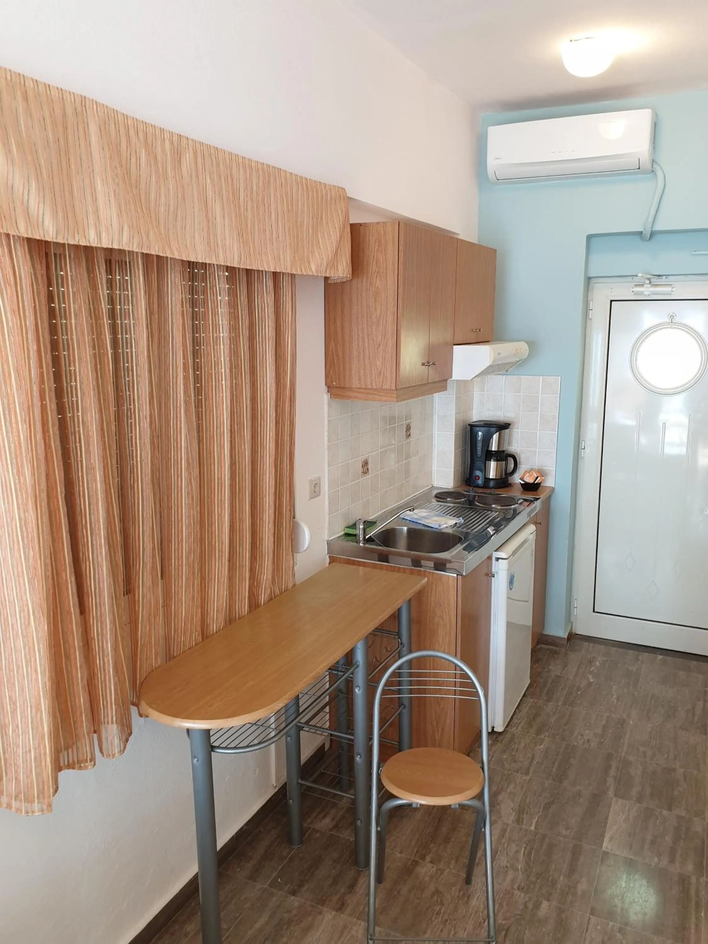 Kitchen or kitchenette in Thalassa House Apartments