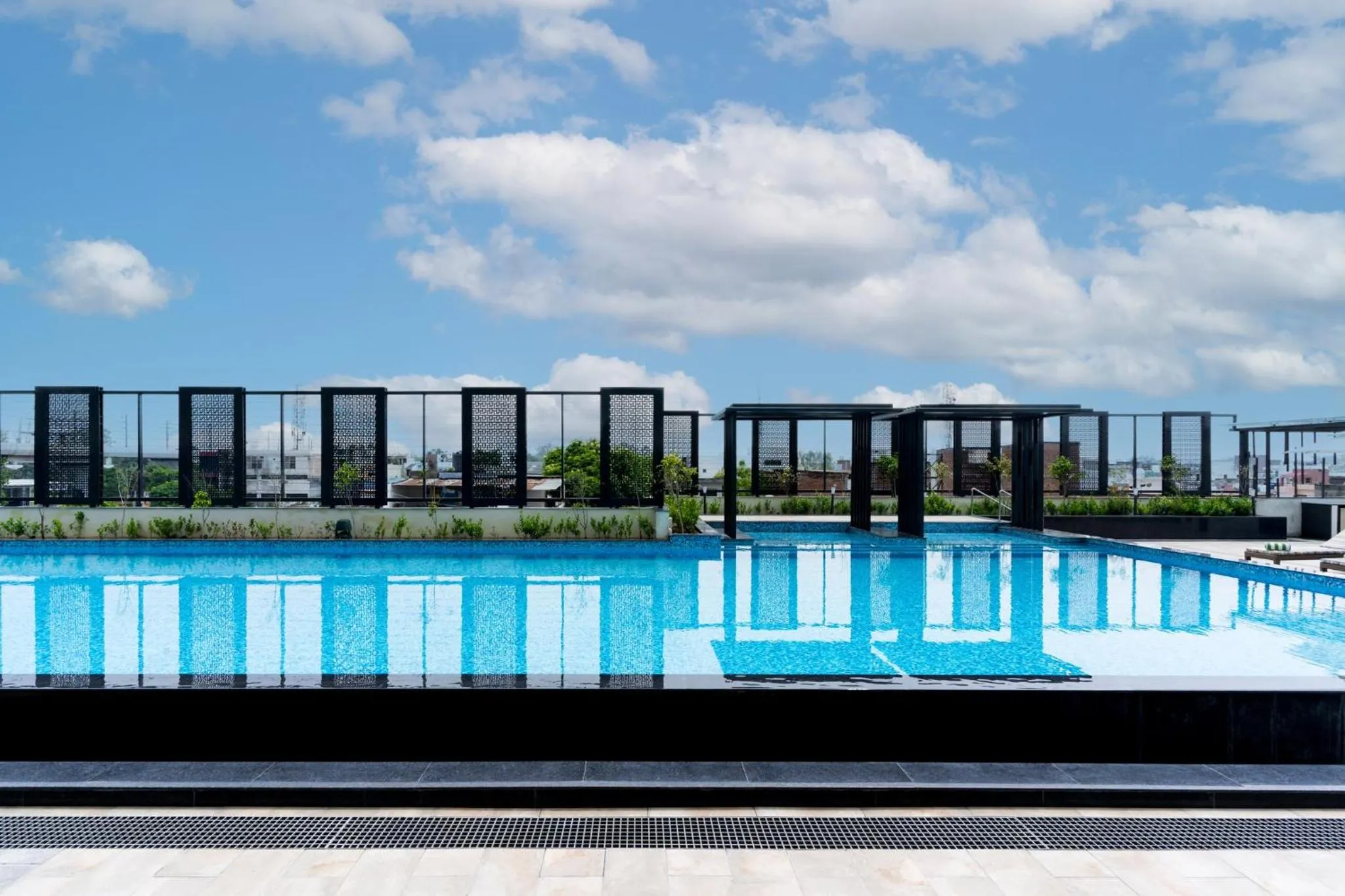 Swimming pool in Holiday Inn Lucknow Airport by IHG