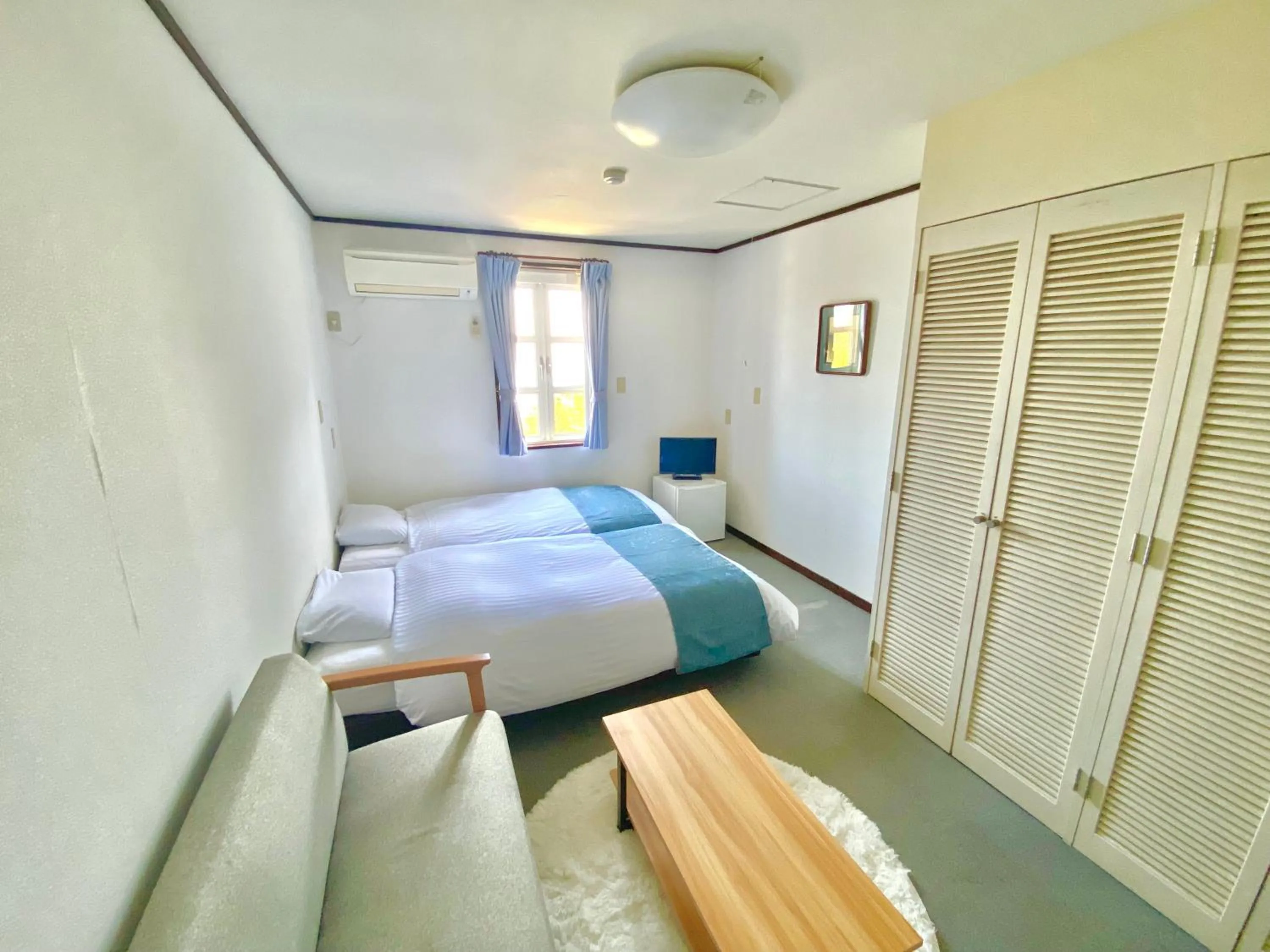 Bed in COCO TERRACE -Ocean View-