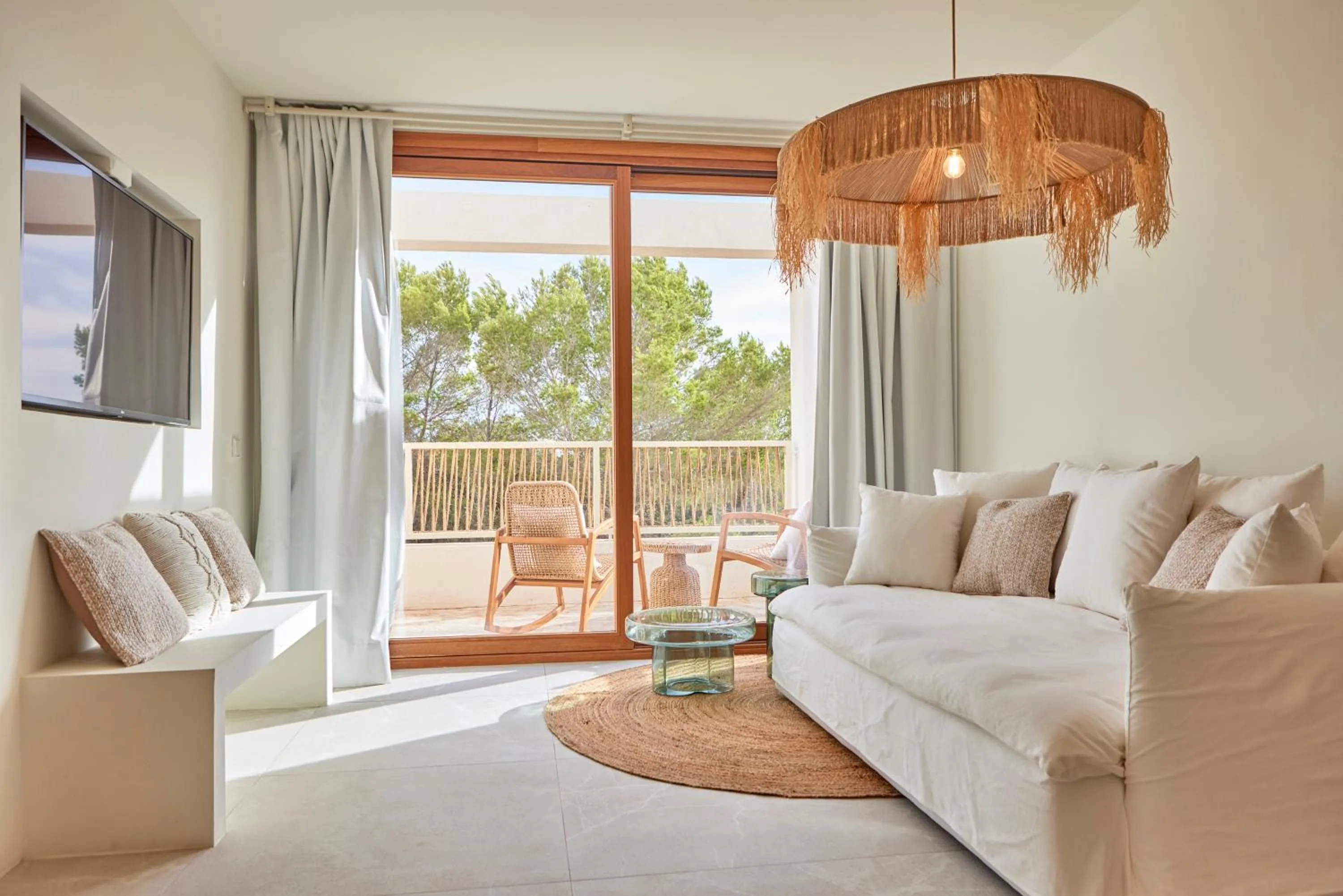 Living room, Bed in Mar Suites Formentera by Universal Beach Hotels
