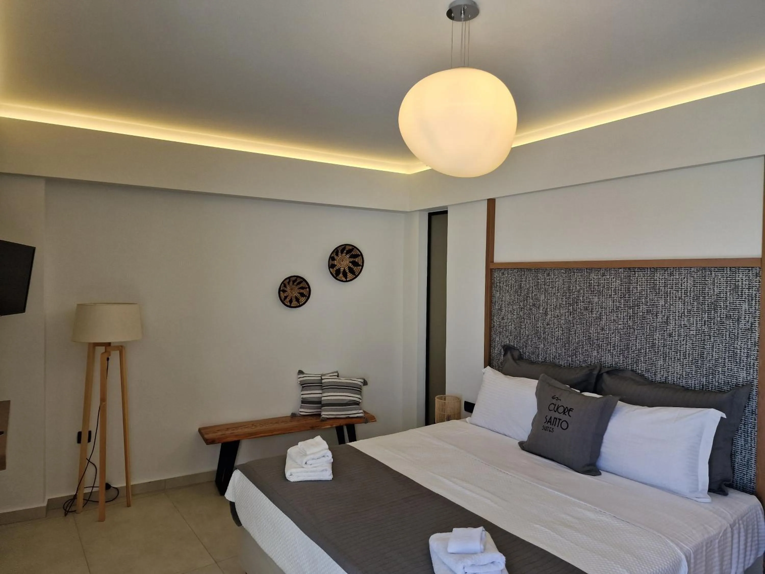 Bed in Cuore Santo Suites