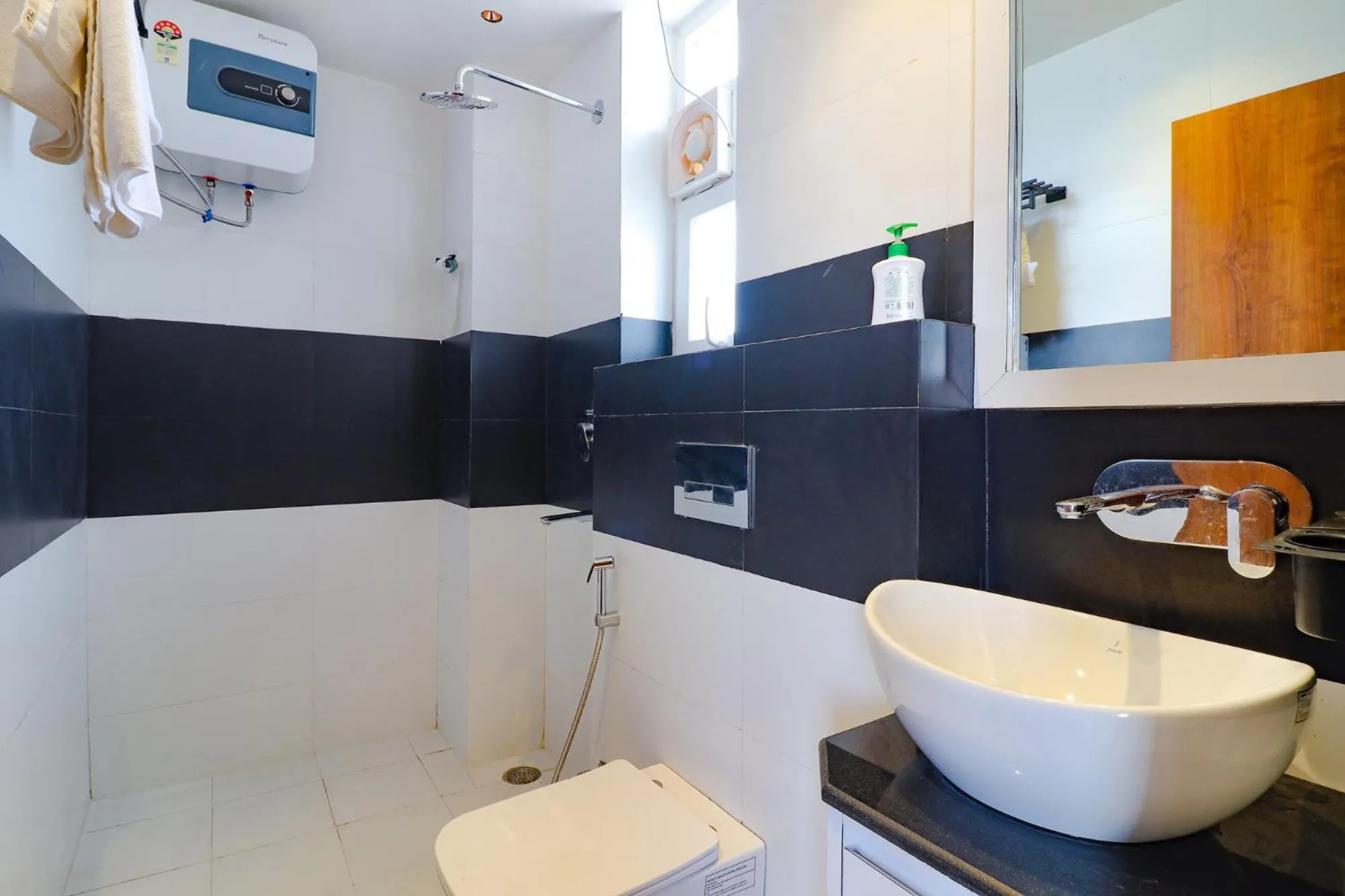 Bathroom in FabHotel Grand Arya