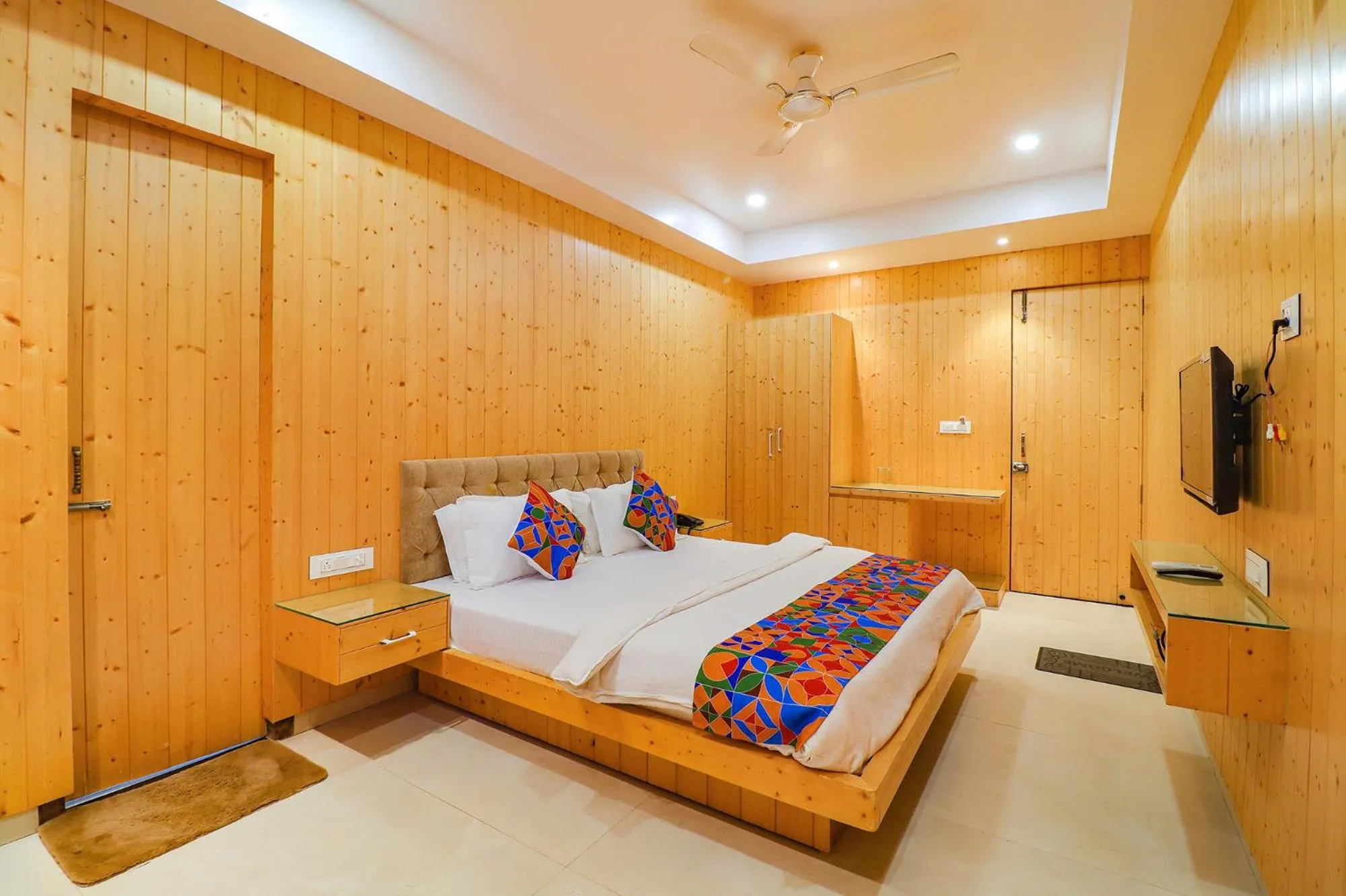 Bed in FabHotel Grand Arya