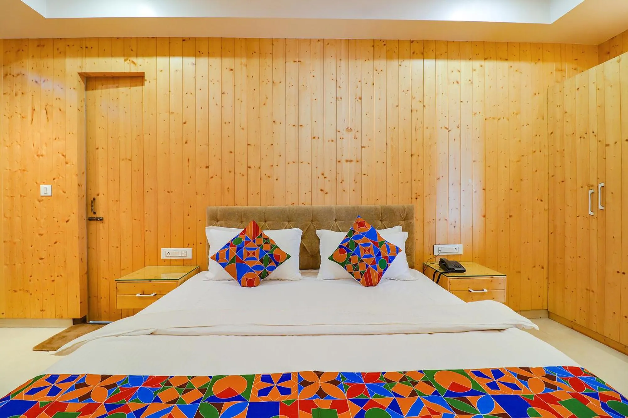 Bed in FabHotel Grand Arya