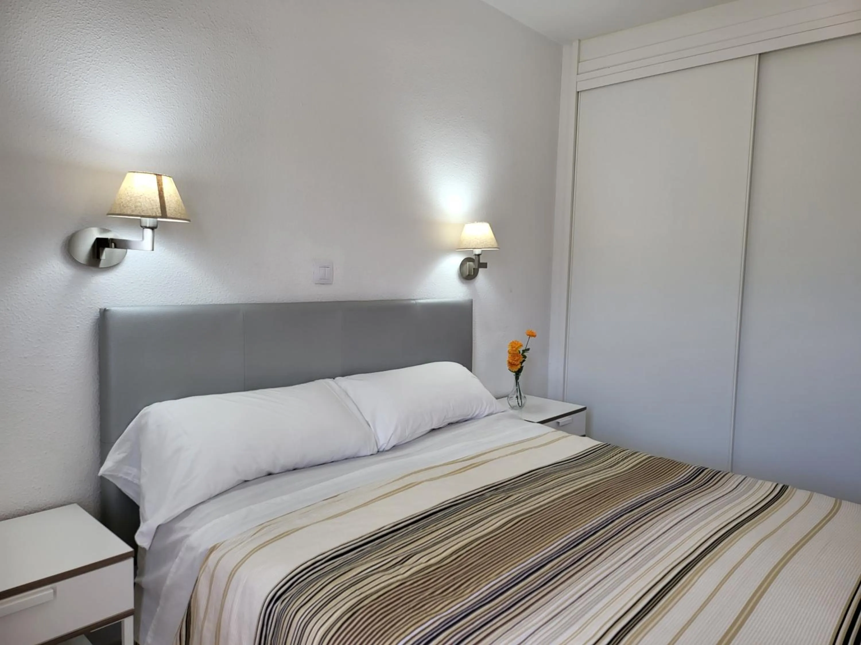 Bedroom, Bed in Las Camelias Apartments