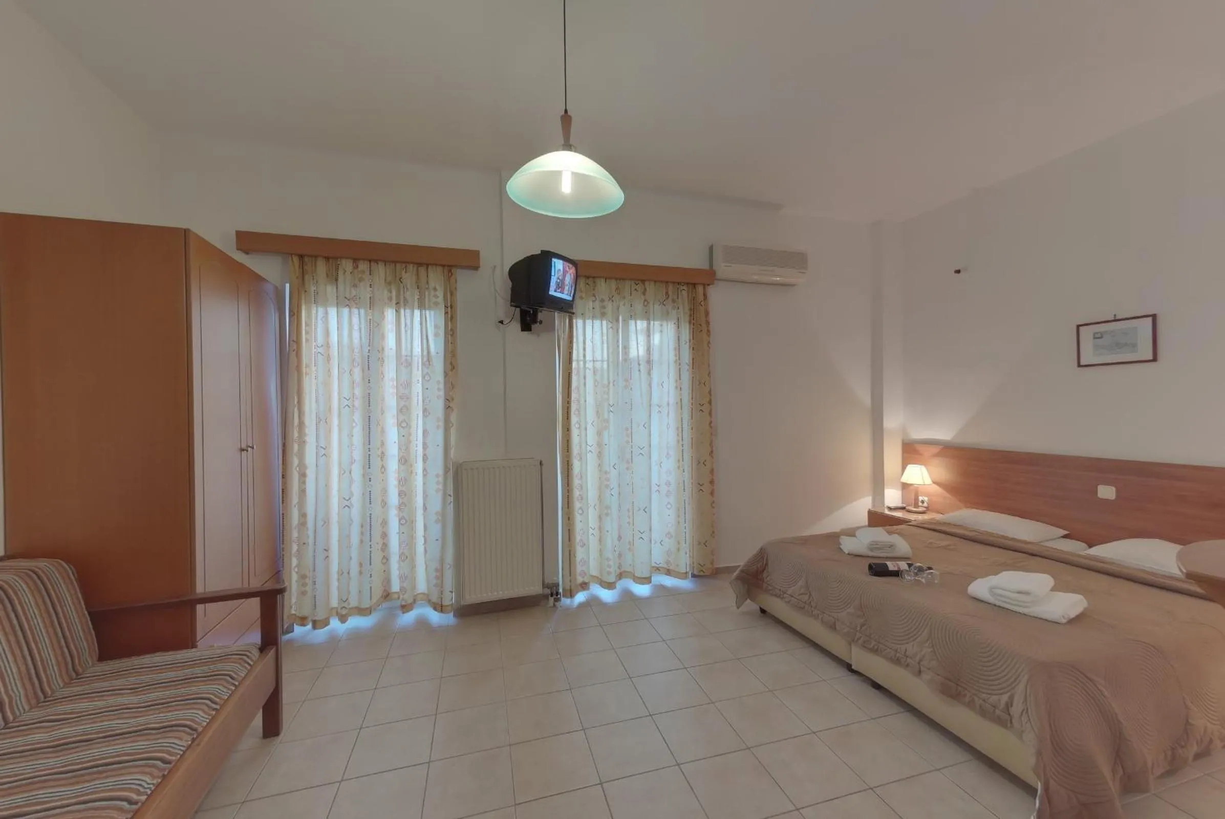 Photo of the whole room, Bed in Marirena Hotel