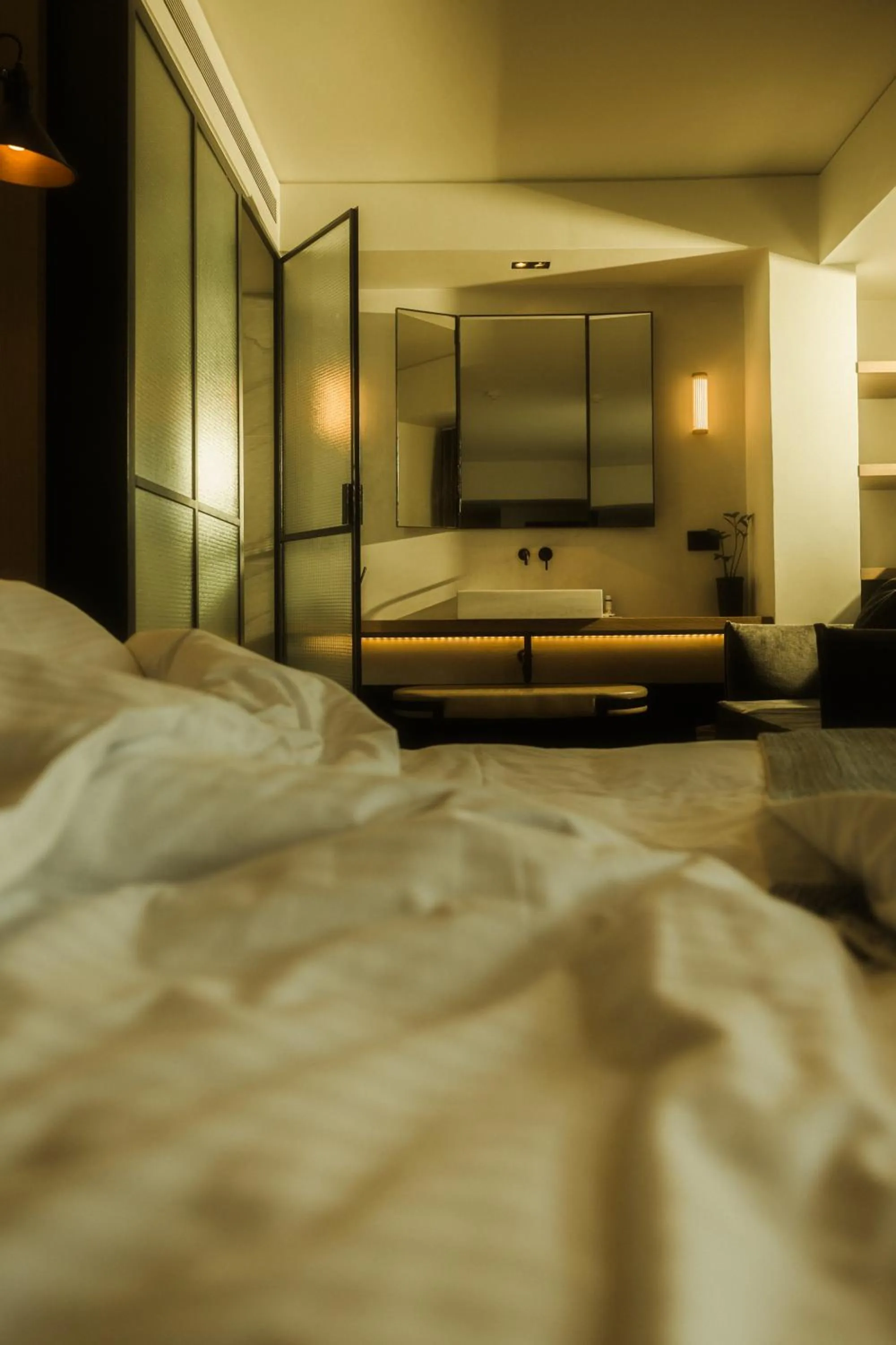 Bed in Niki Athens Hotel