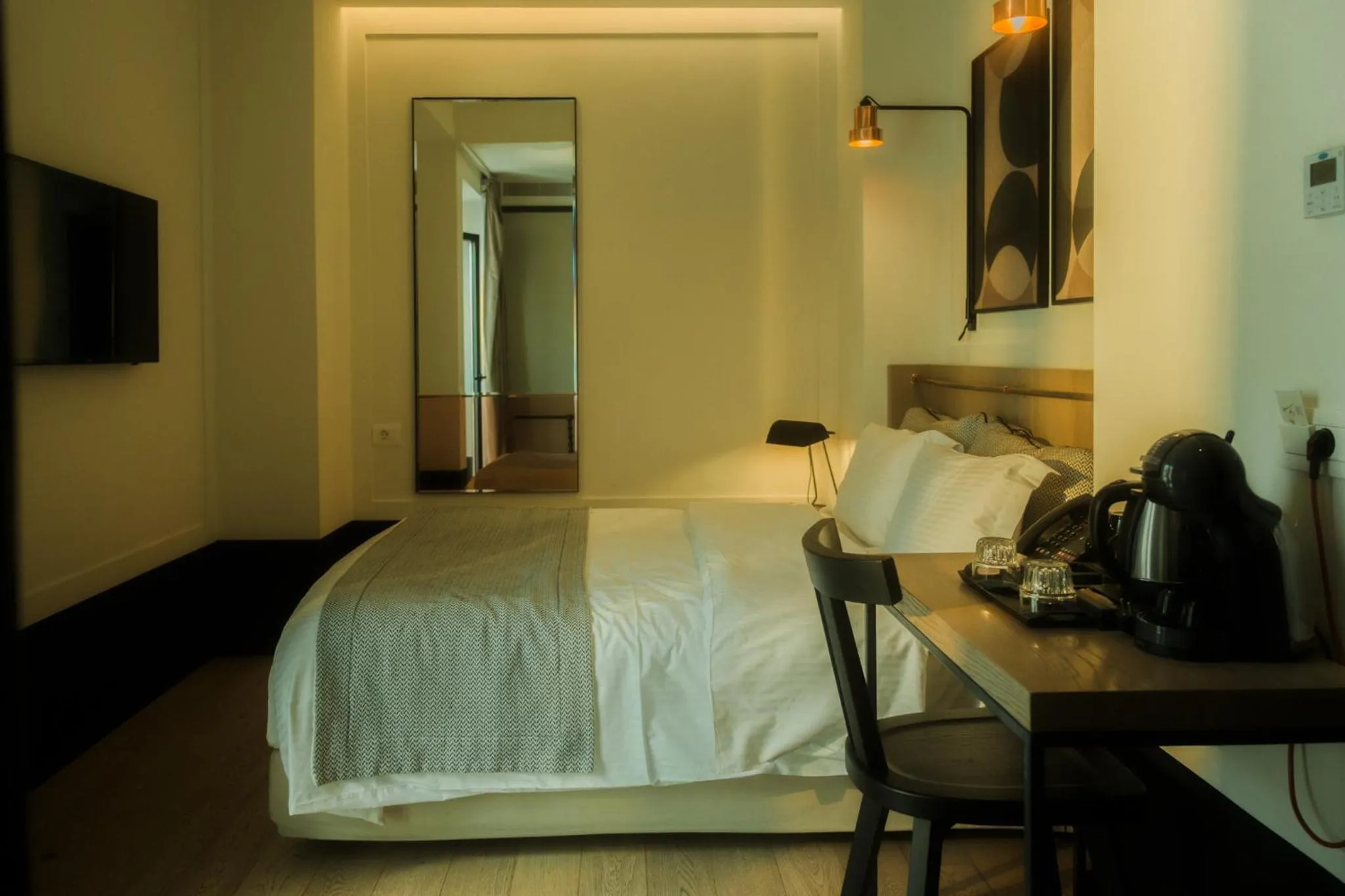 Bed in Niki Athens Hotel