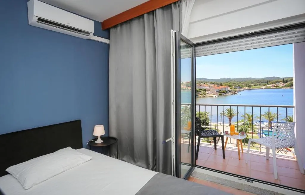 Bed in Hotel Lumbarda