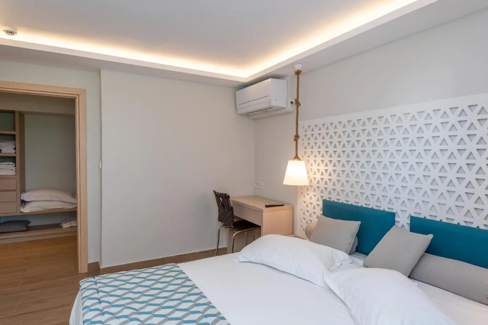 Bed in Triton Boutique Hotel