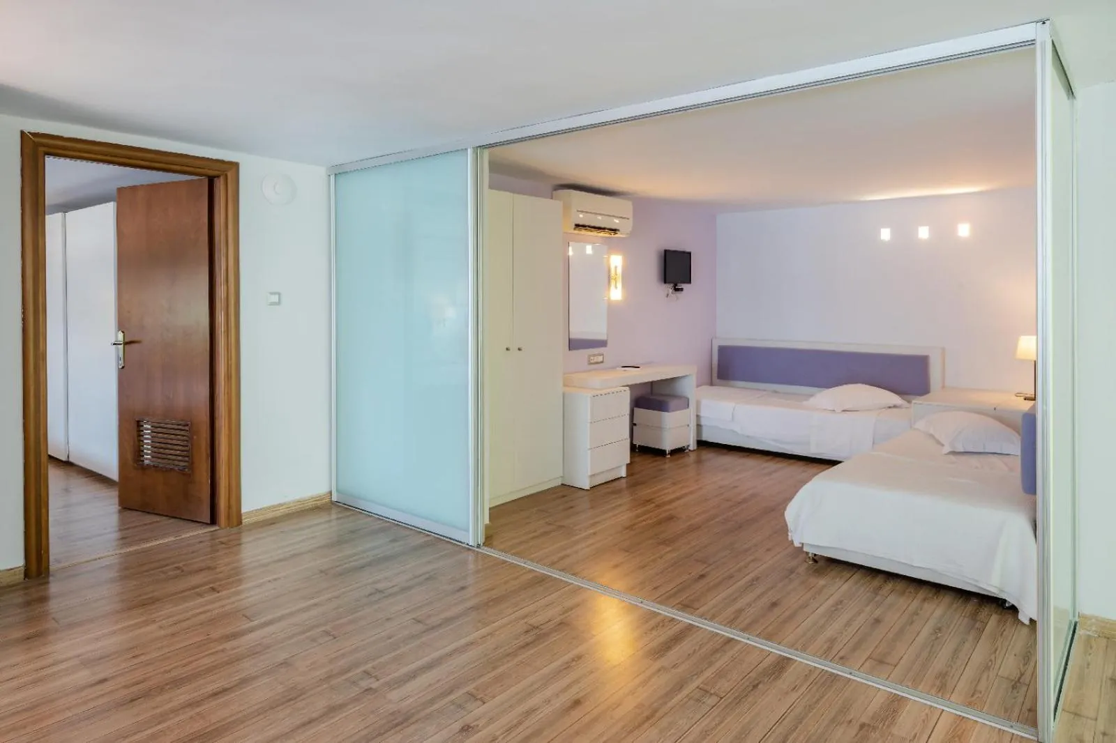 Bed in Triton Boutique Hotel