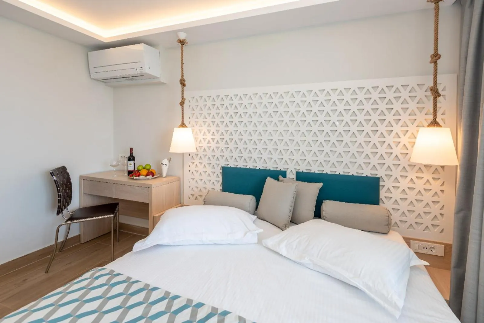 Bed in Triton Boutique Hotel