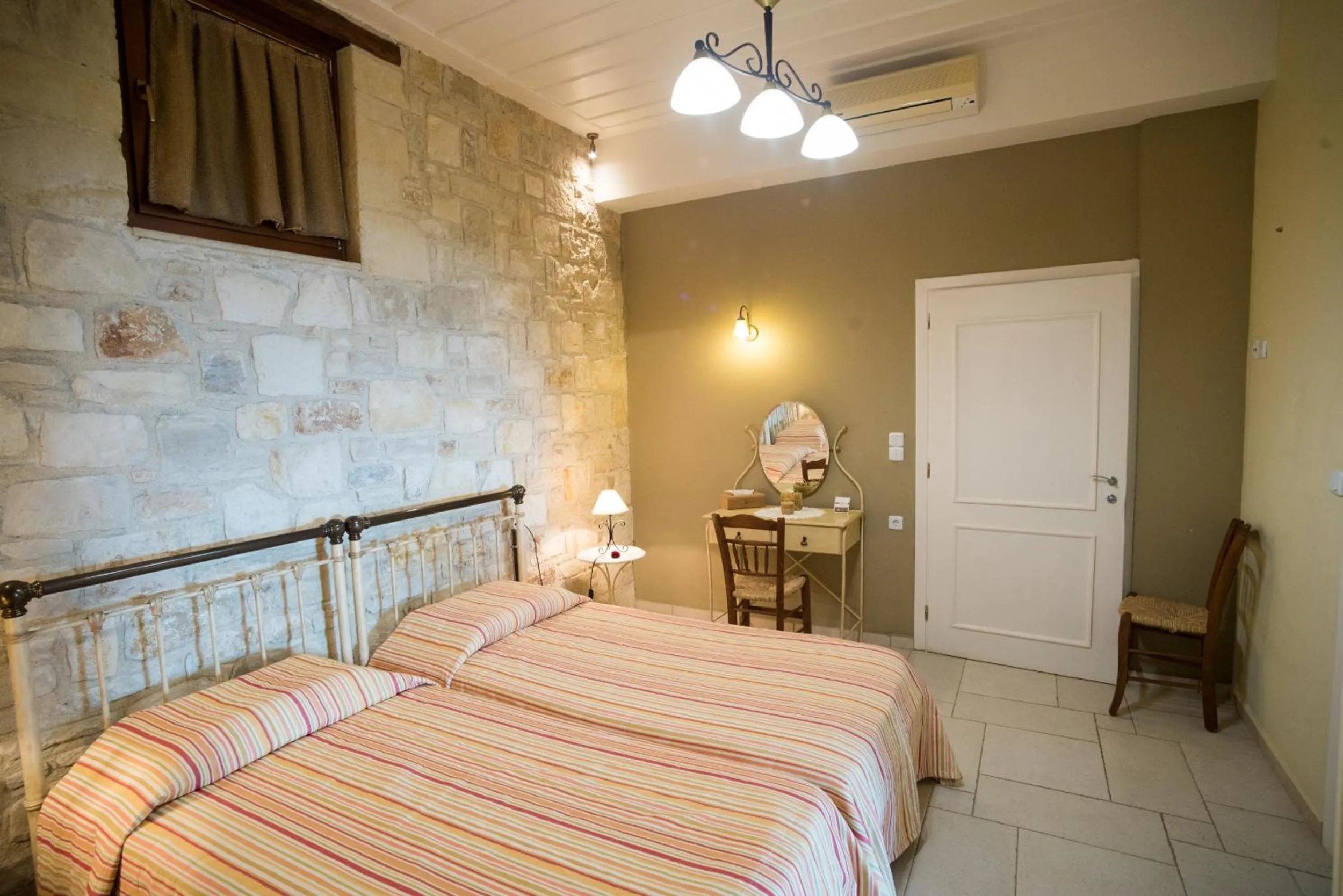 Bed in Katalagari Country Suites