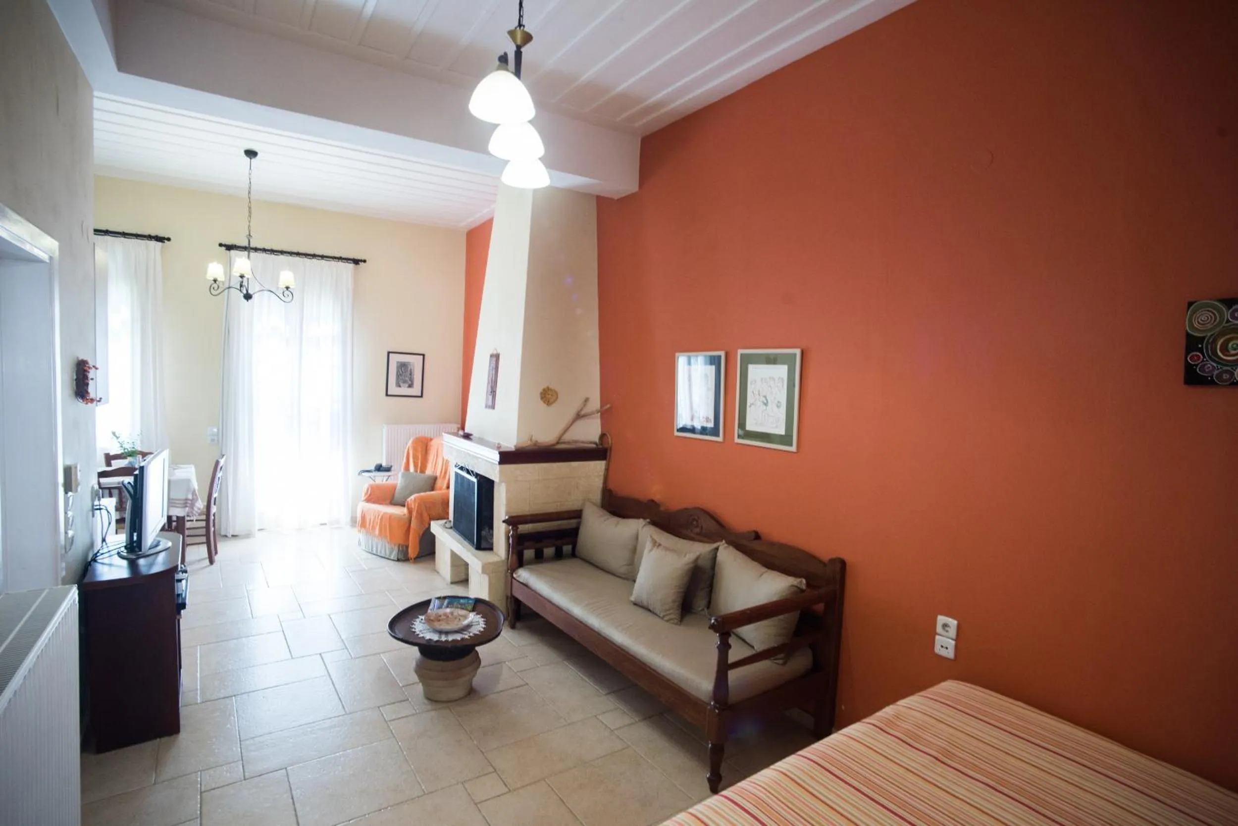 Seating area, Bed in Katalagari Country Suites