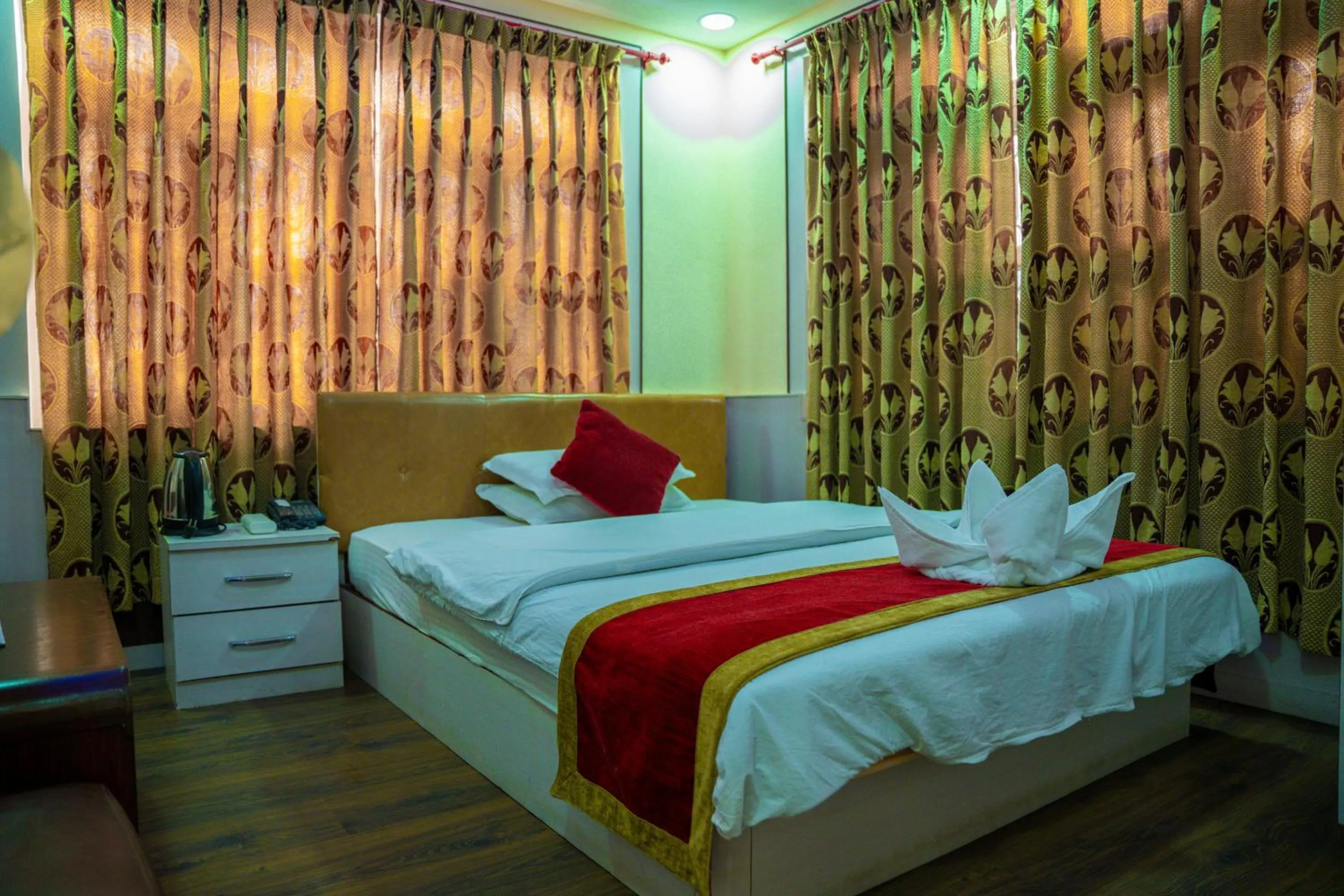 Bed in Gautam Hotel