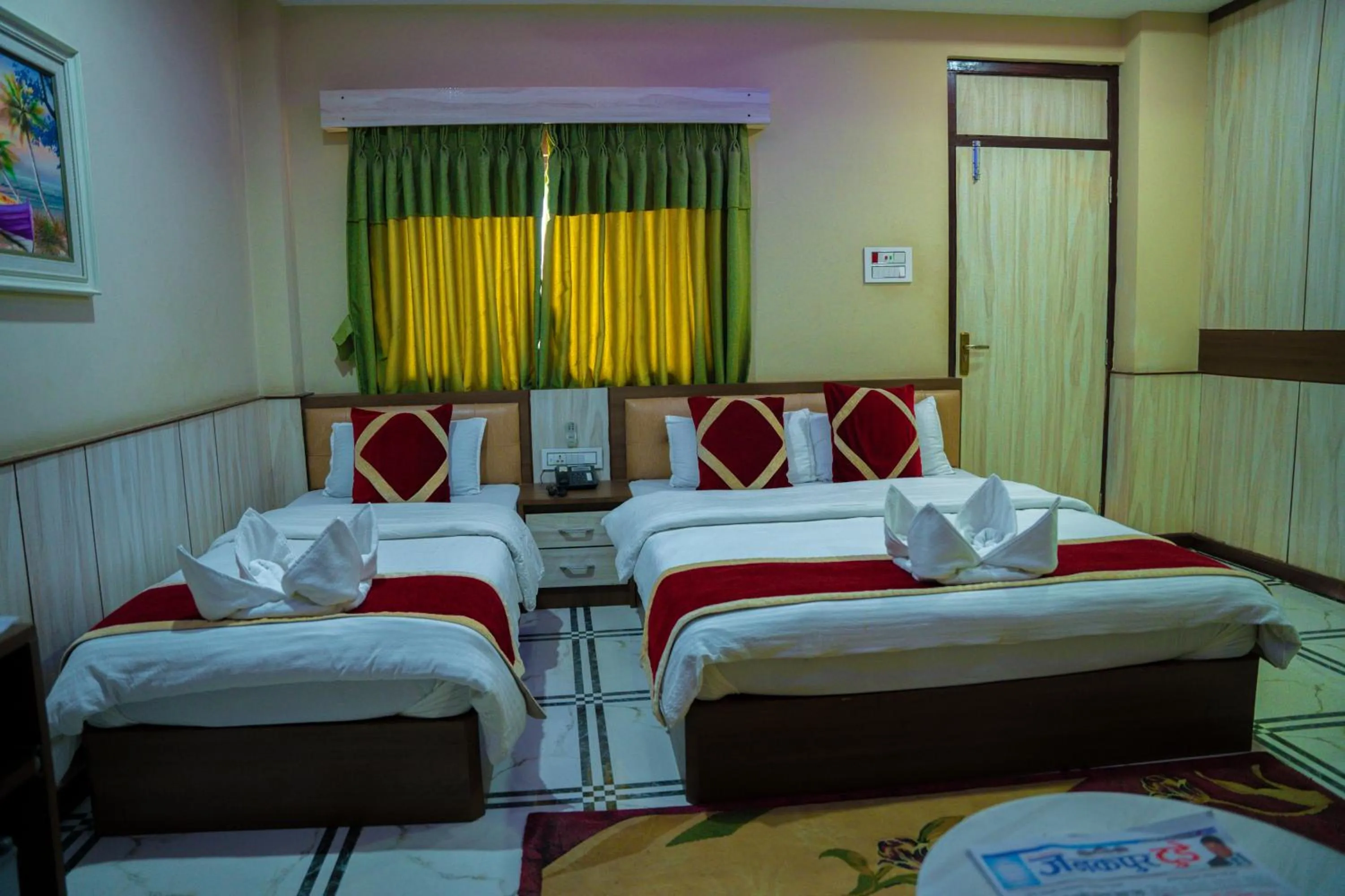 Bed in Gautam Hotel