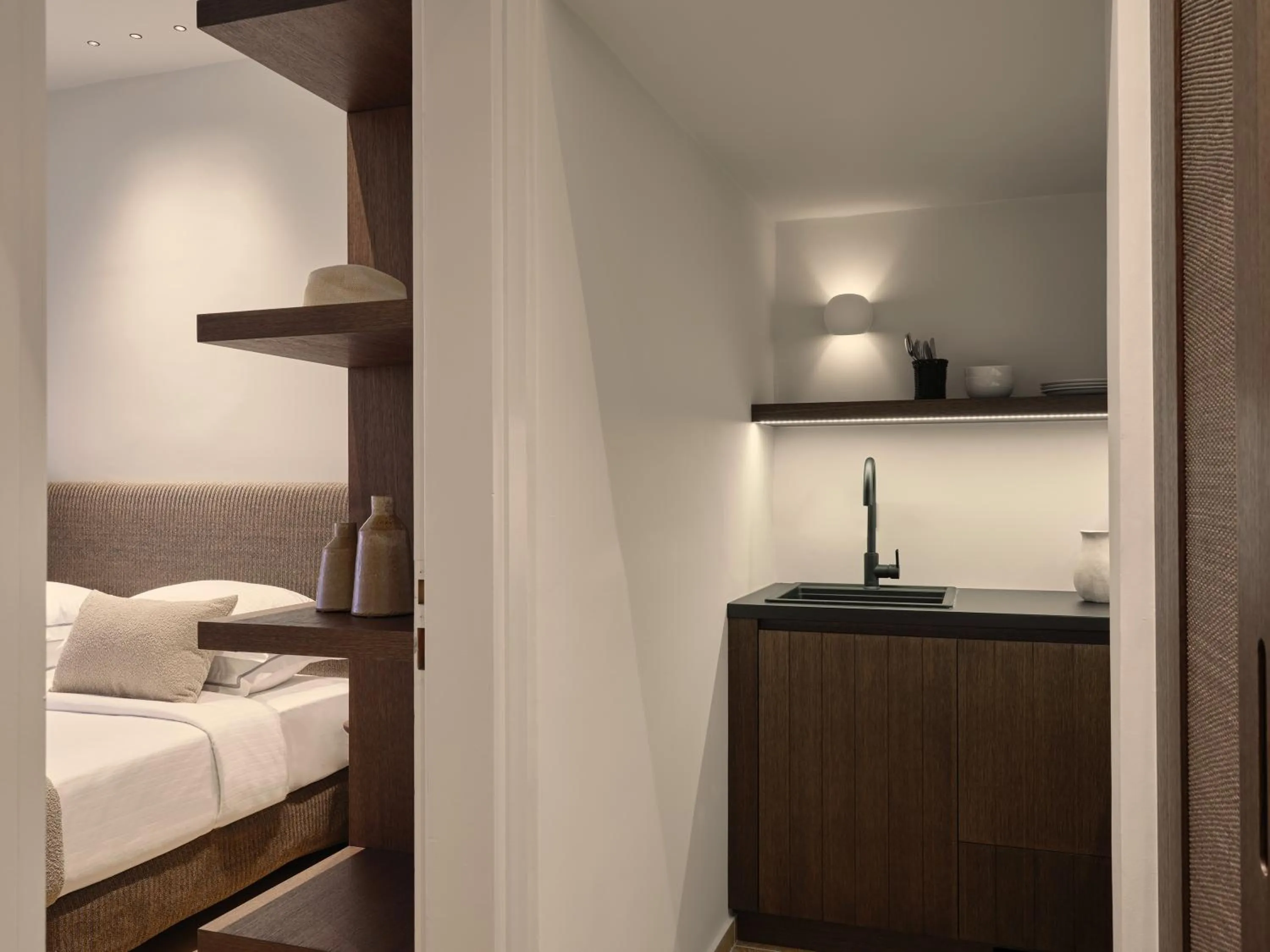 Bed in Loizos Stylish Residences