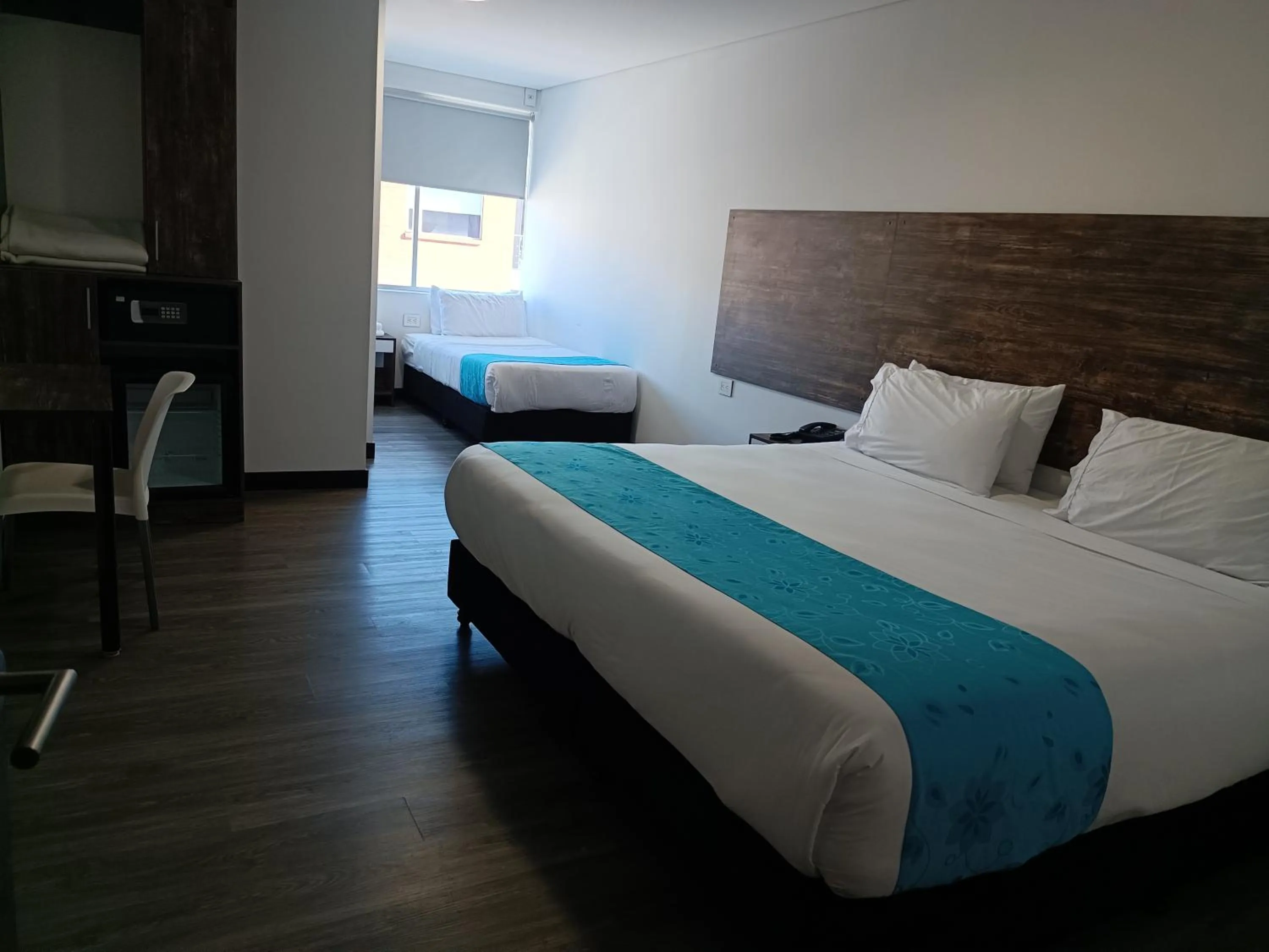 Bed in HOTEL AMERICAN VISA CORPORATE