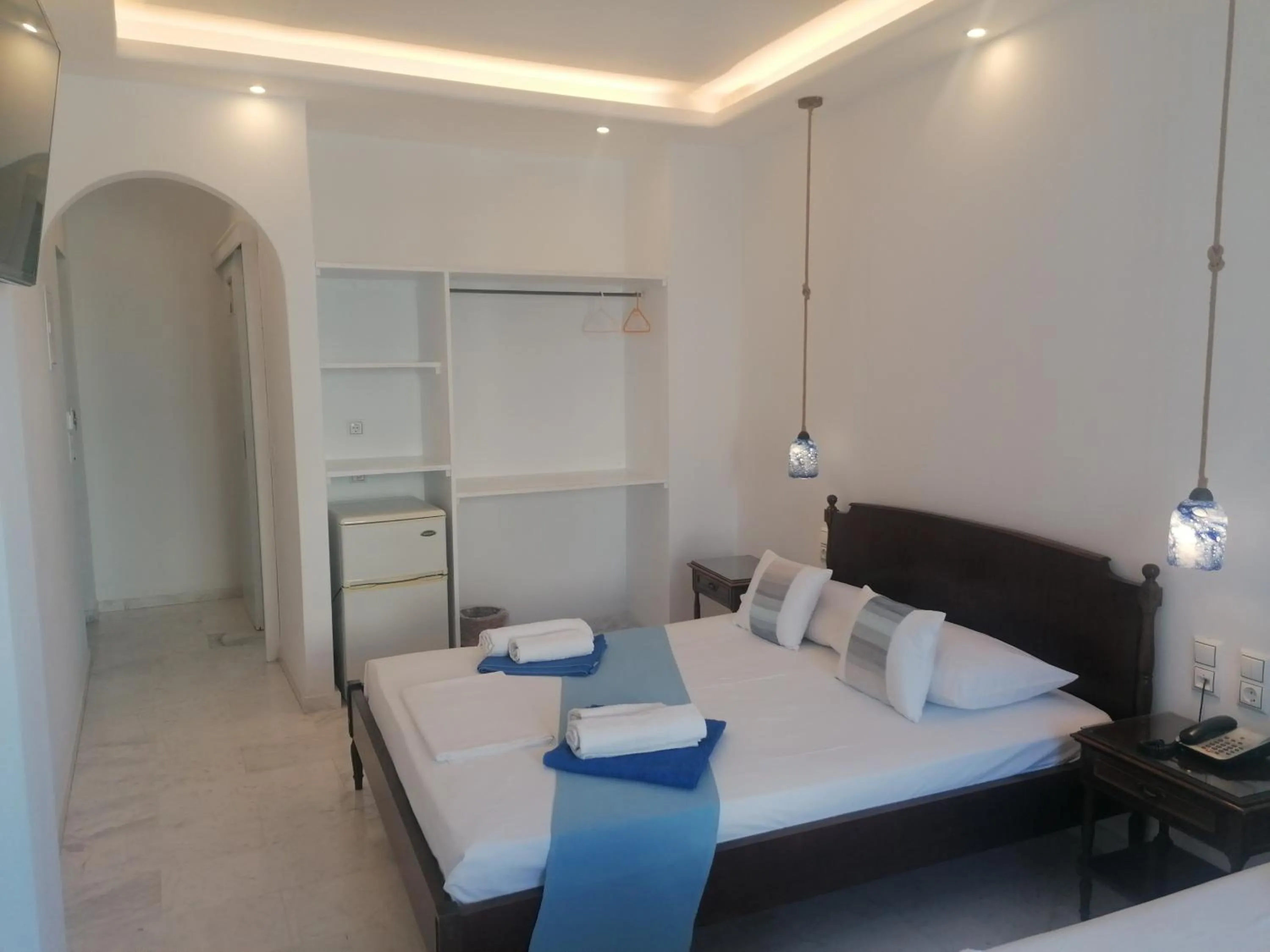 Bed in Adonis Hotel Naxos