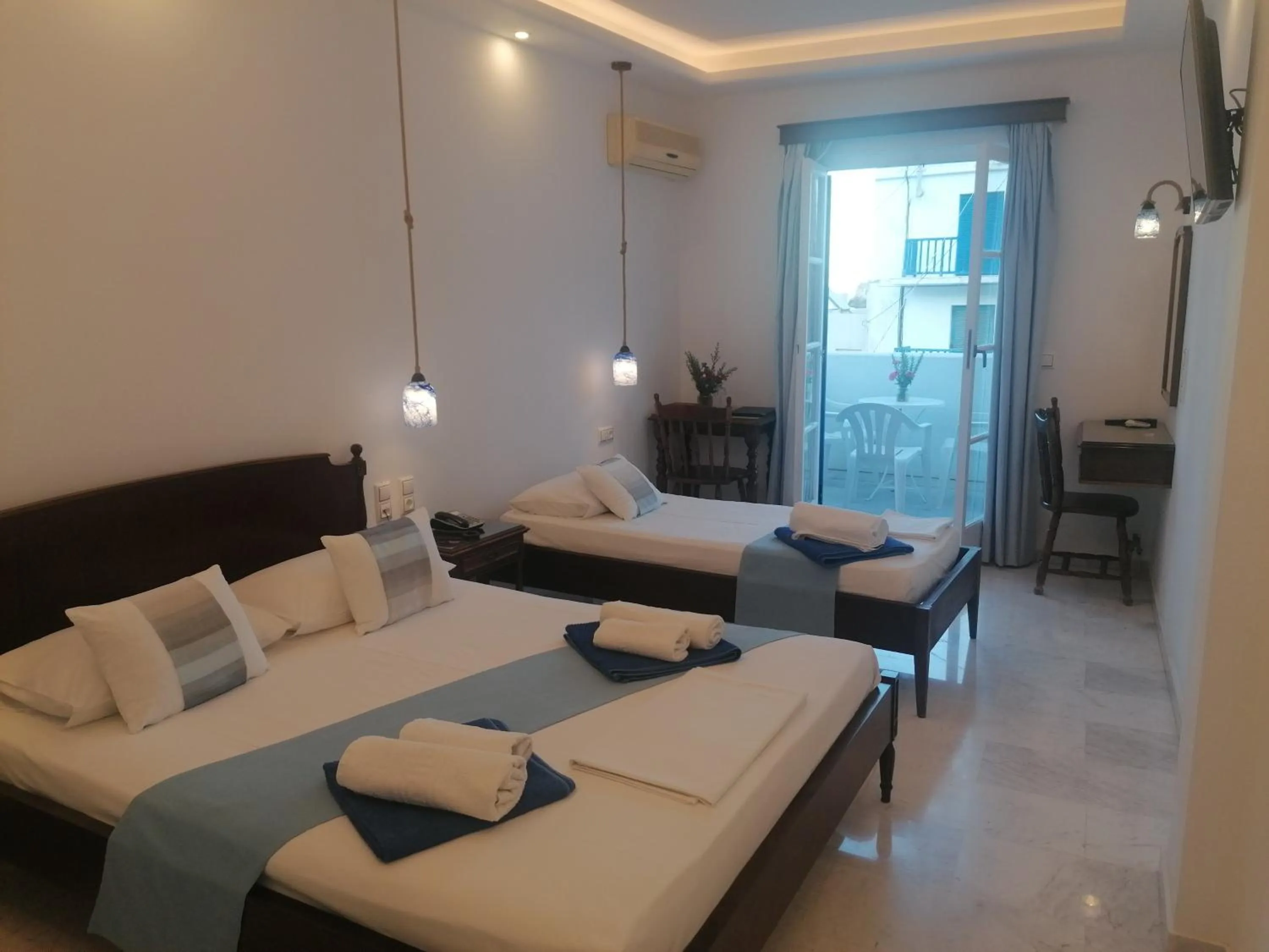 Bed in Adonis Hotel Naxos