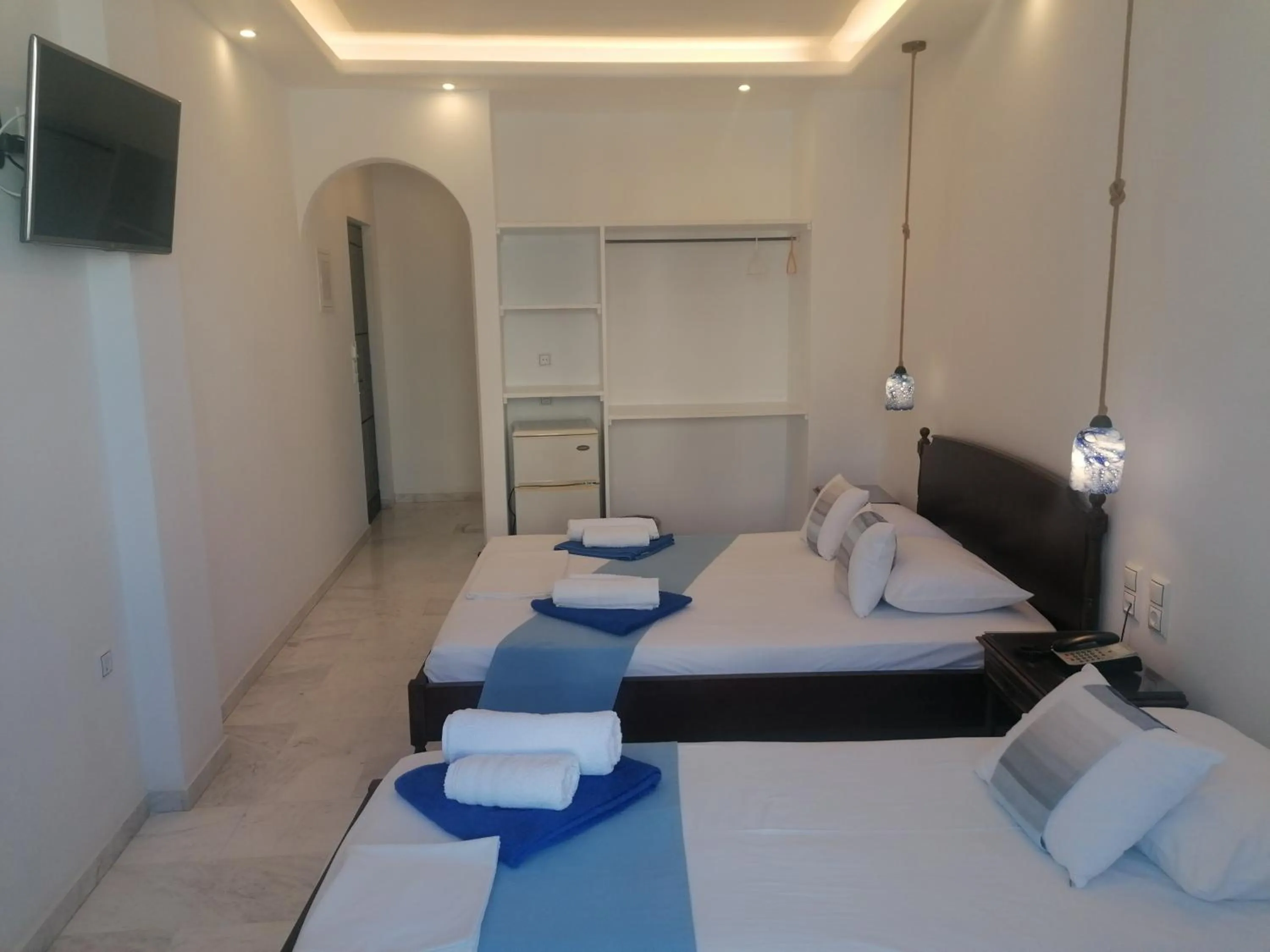 Bed in Adonis Hotel Naxos