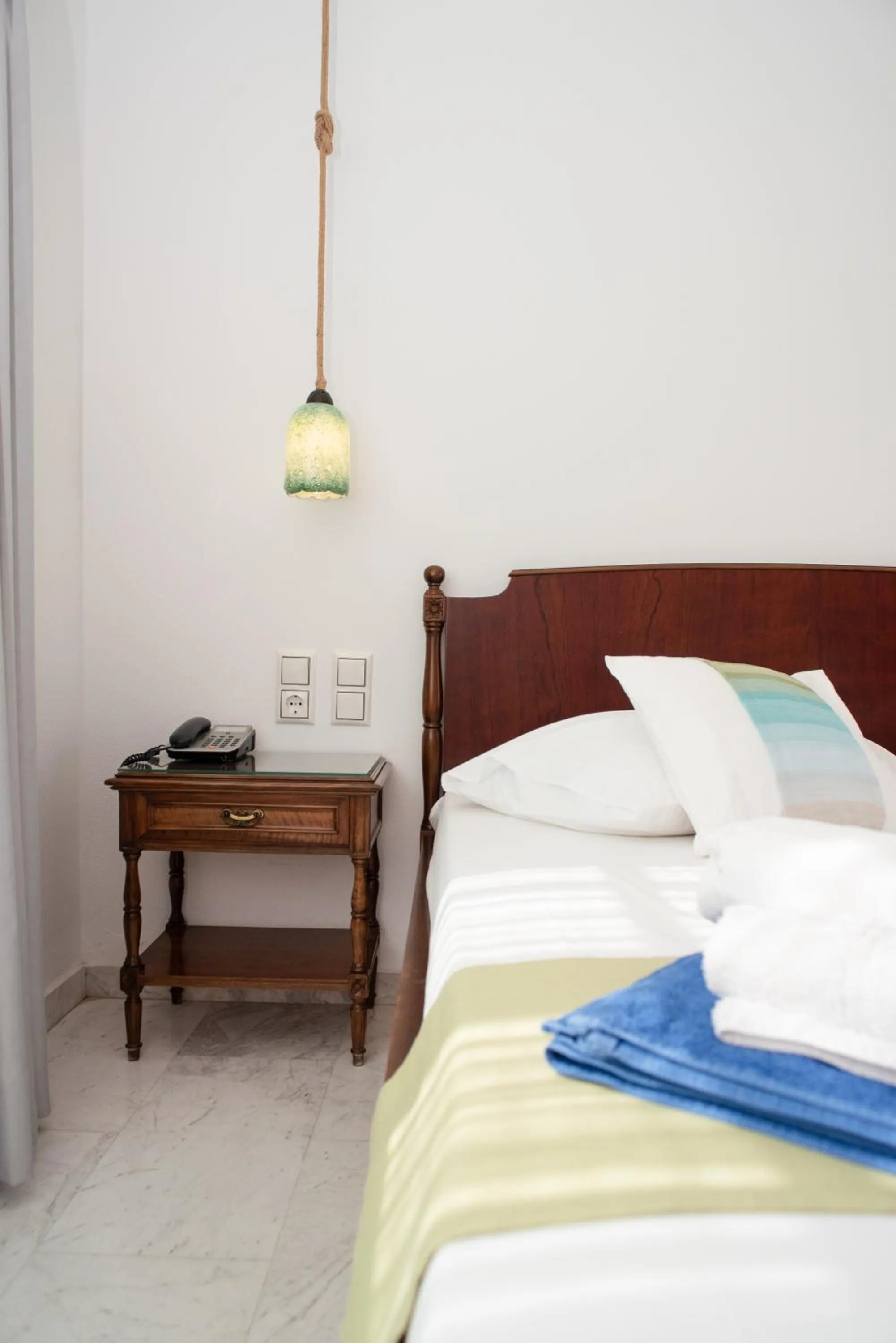 Bed in Adonis Hotel Naxos