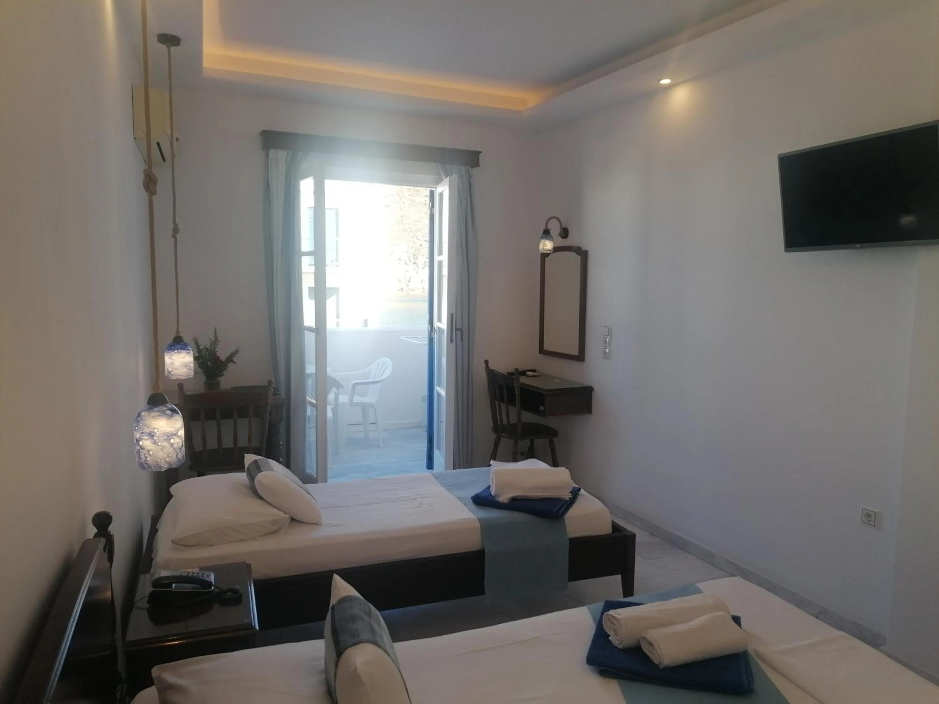 Bed in Adonis Hotel Naxos